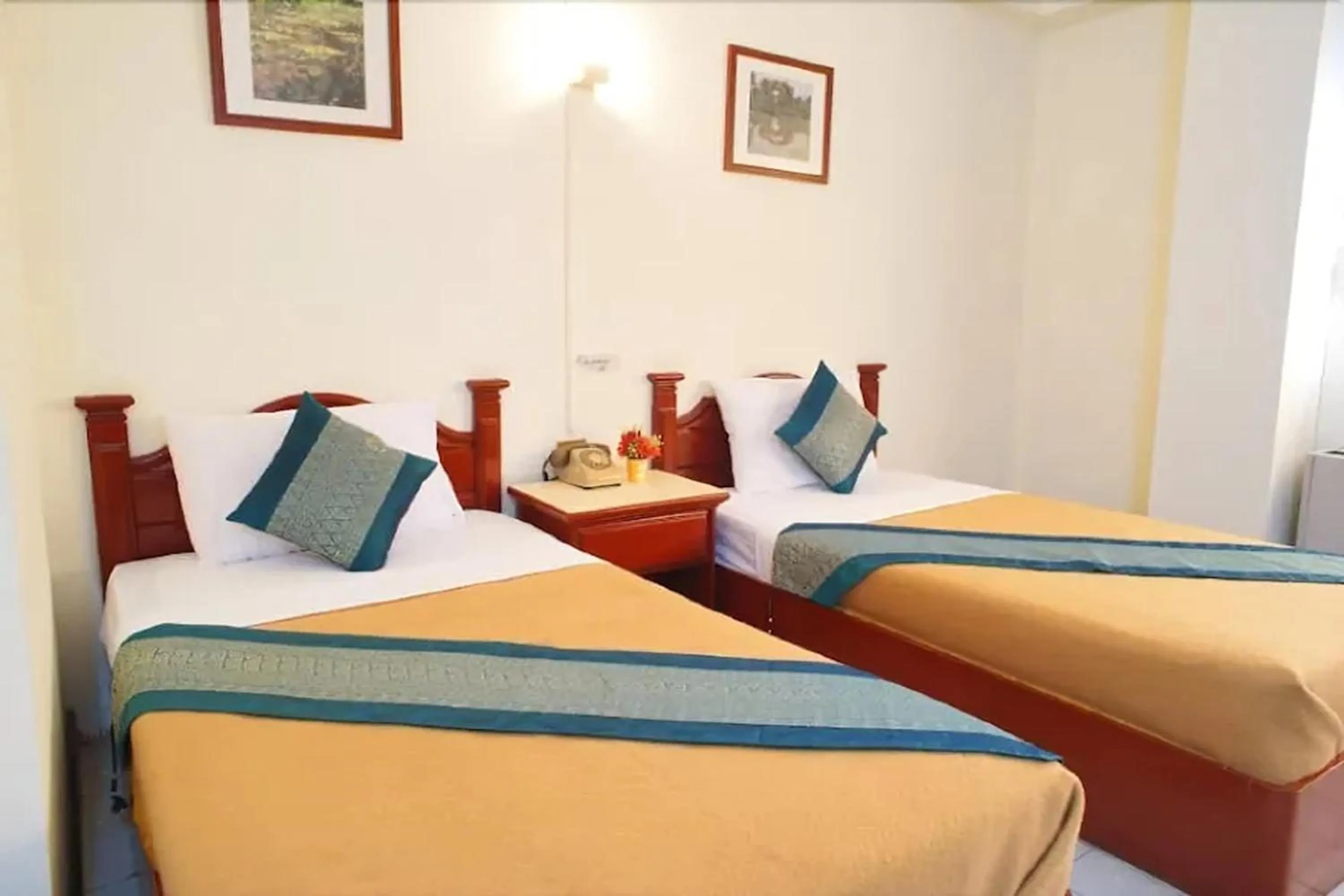 Bed in Khelang Nakorn Hotel