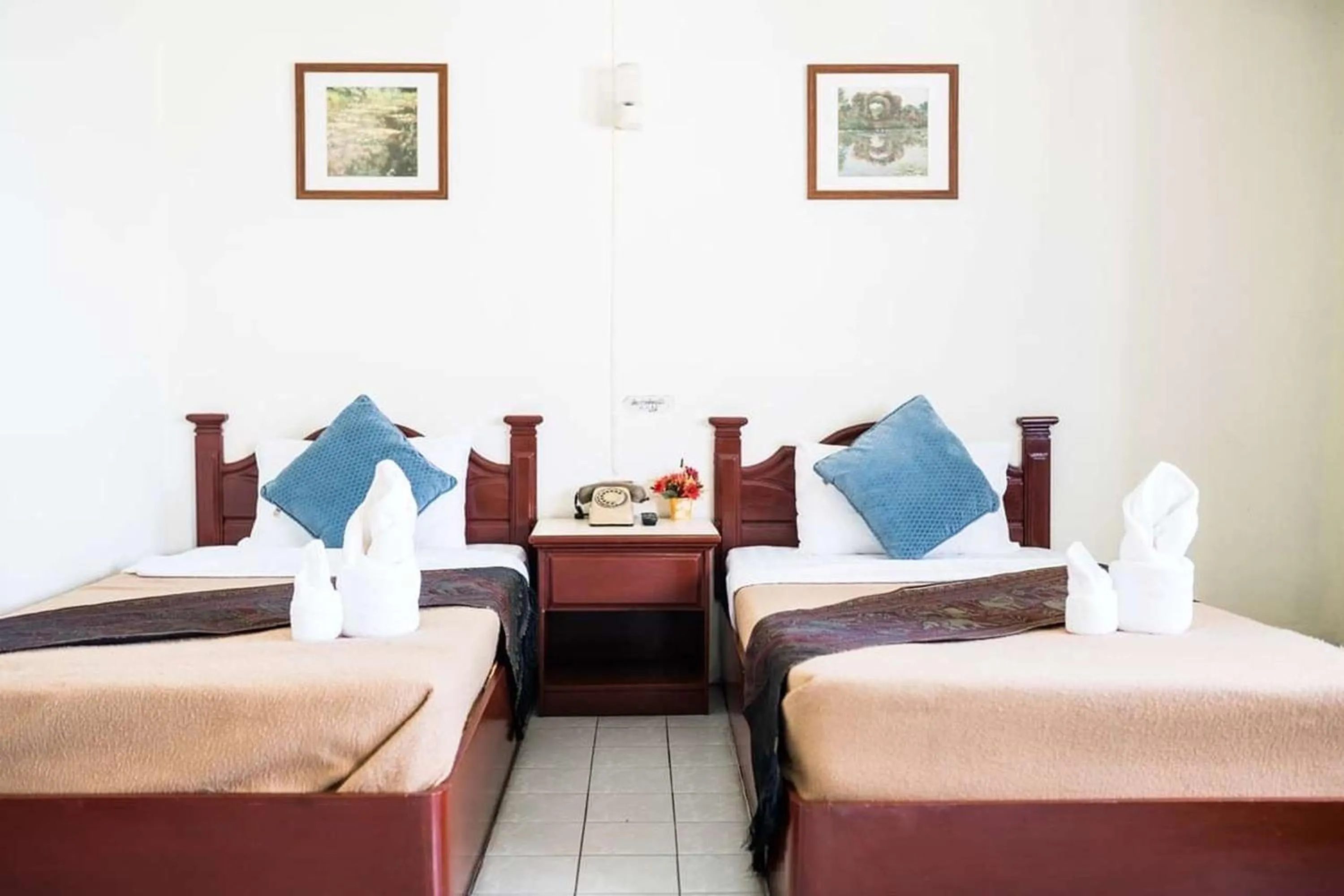 Bed in Khelang Nakorn Hotel