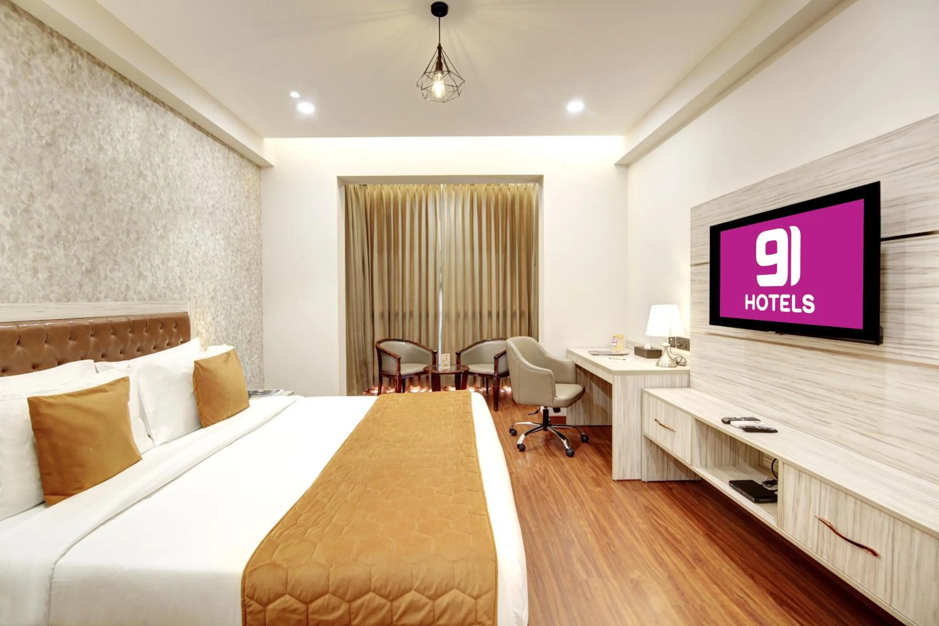 Seating area, Bed in Hotel 91 Millennium Huda