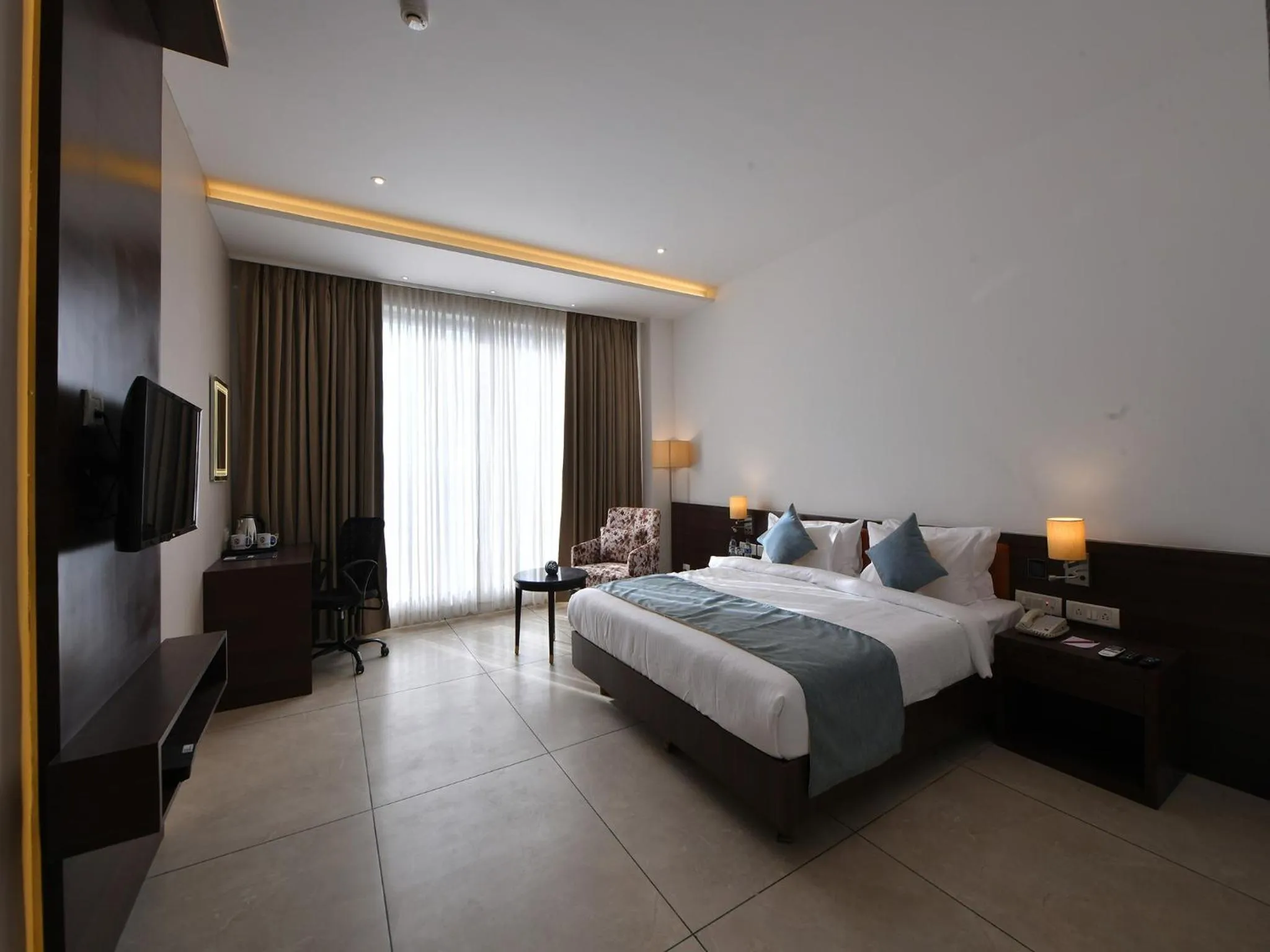 Bed in Clubhouse Hotel by CheckIn Morbi