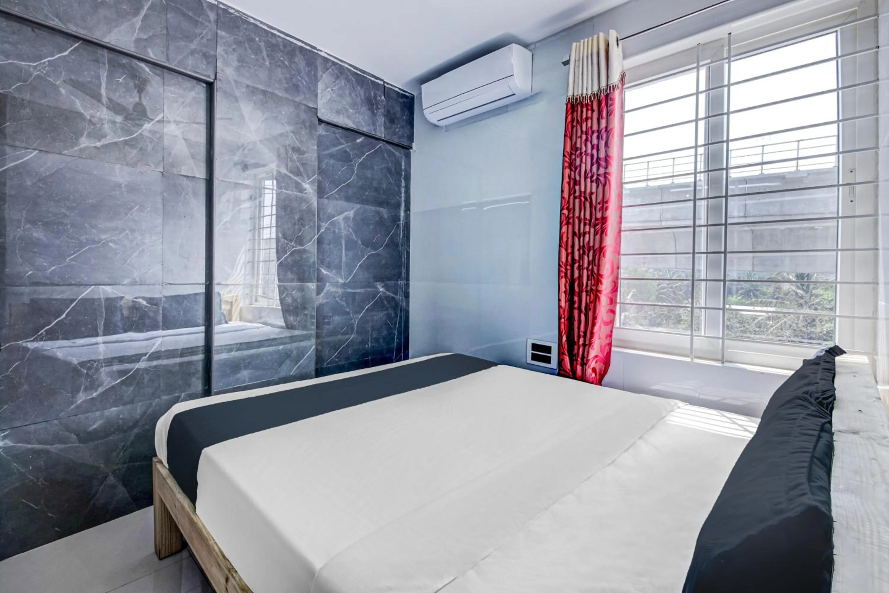 Bedroom in Collection O Sapthagiri Inn