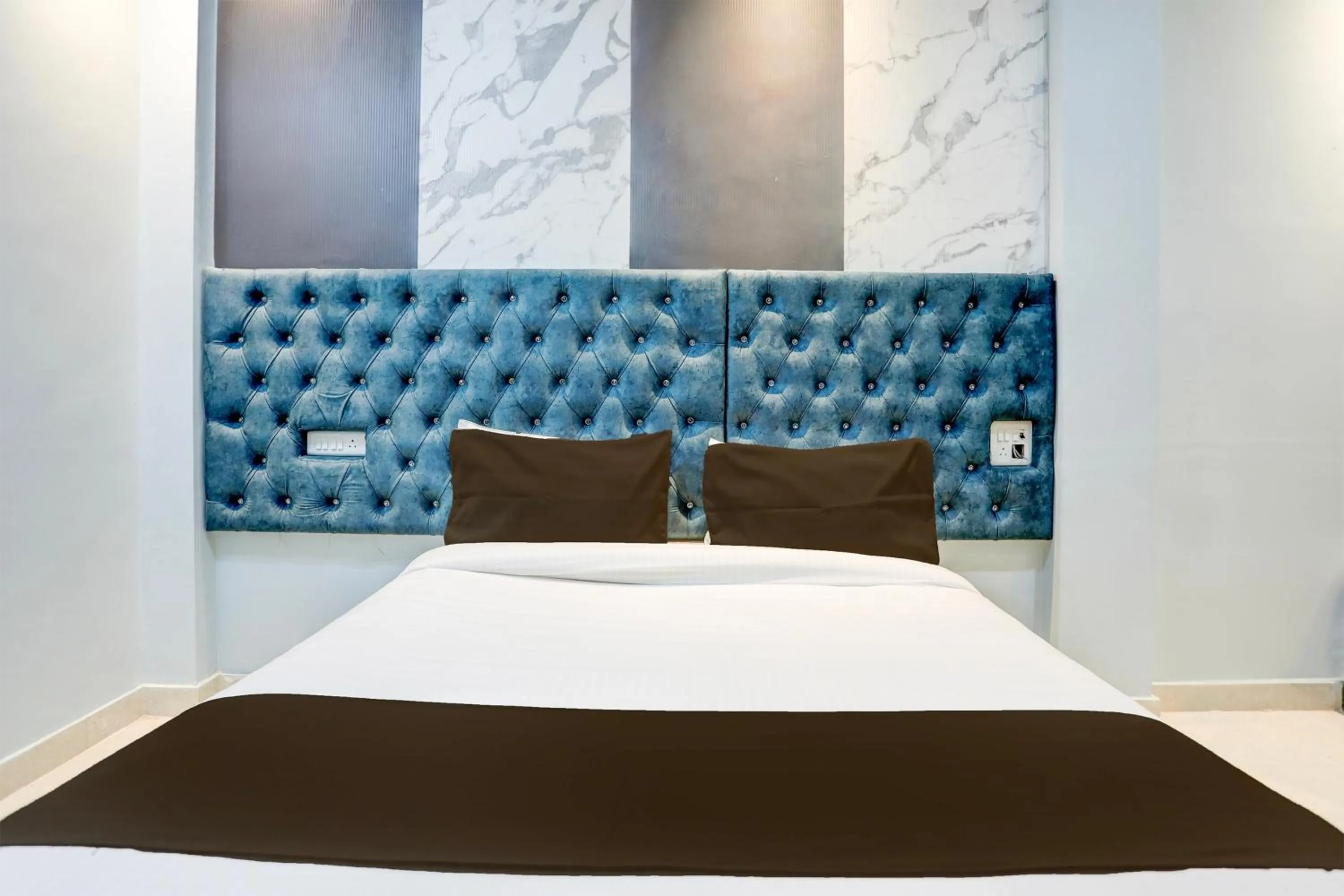 Bedroom in Super Hotel O SHIVA VALLEY HOTEL