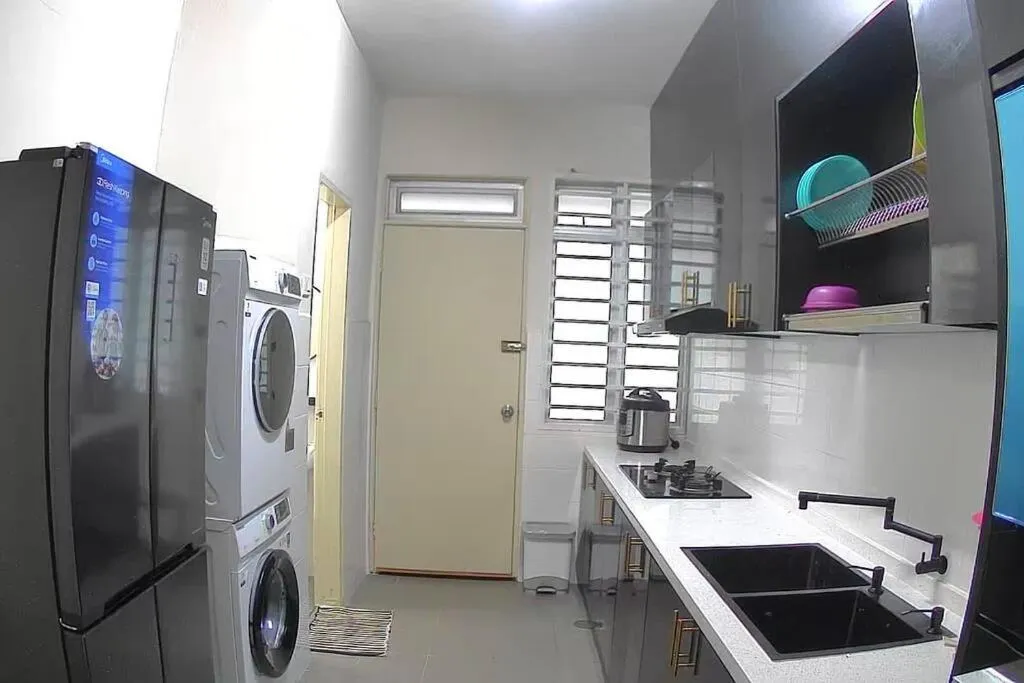 washing machine in Teratak Teratai Homestay- Corner