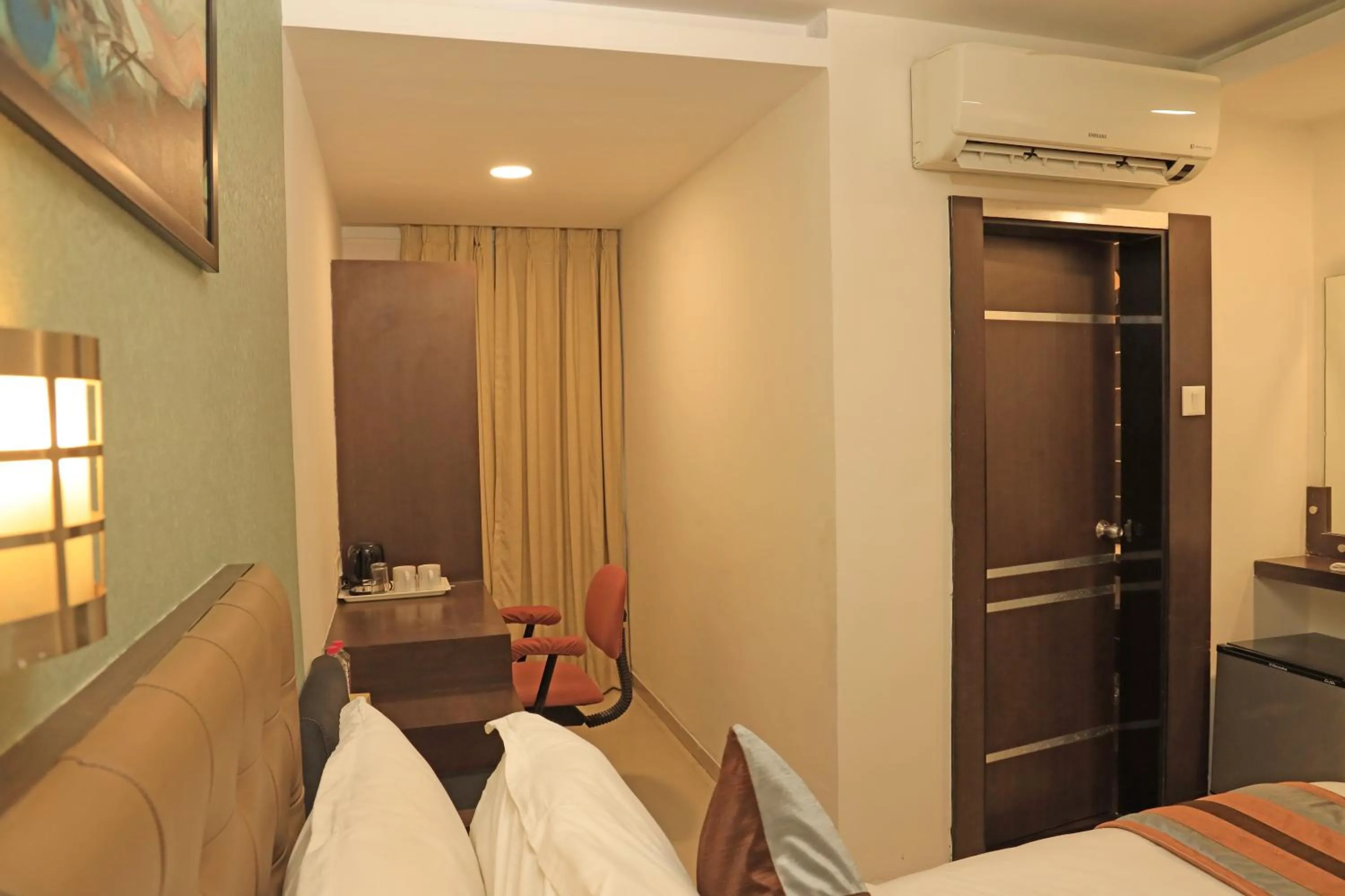 Photo of the whole room, Bed in Click Hotel Yuvraj