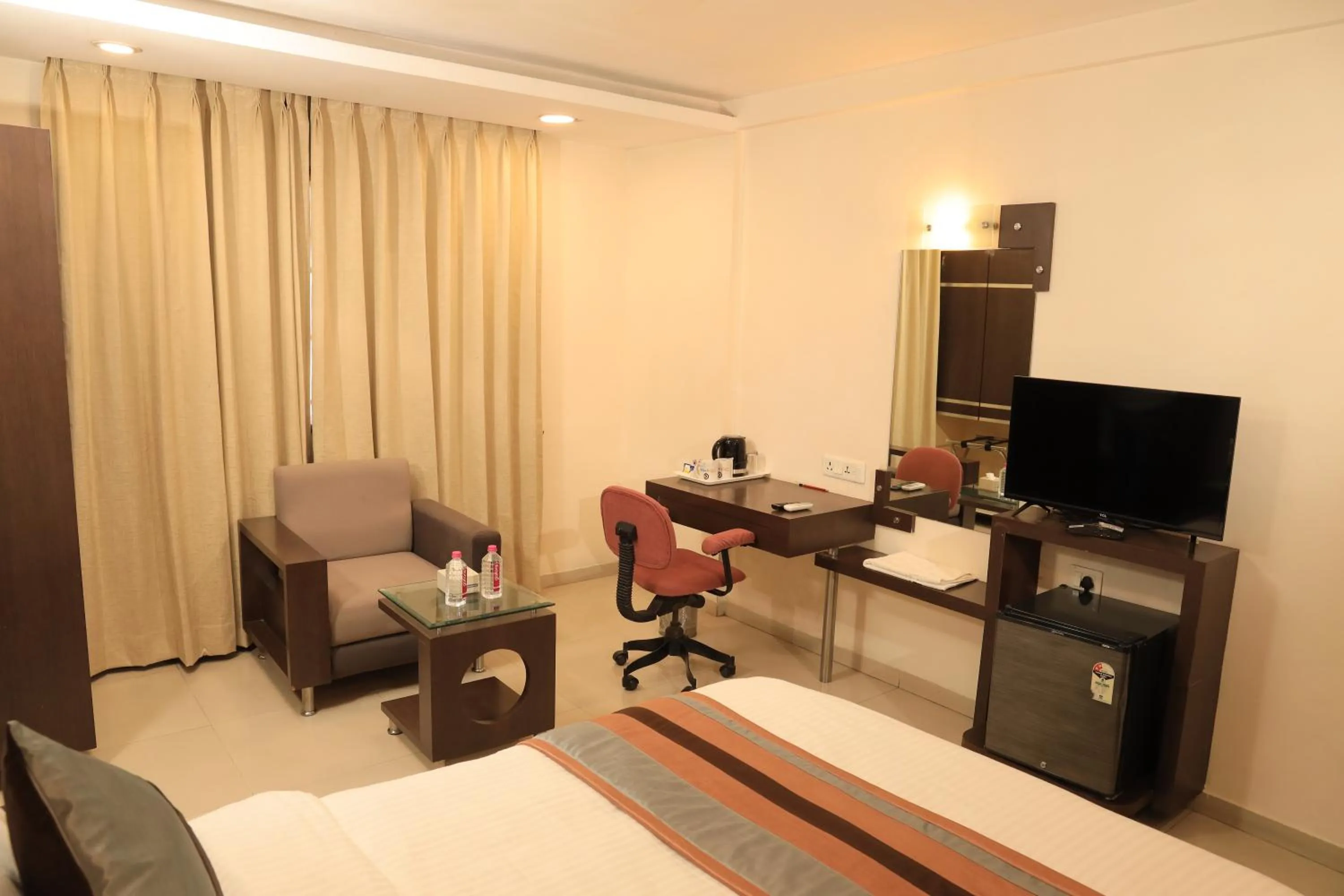TV and multimedia, Bed in Click Hotel Yuvraj