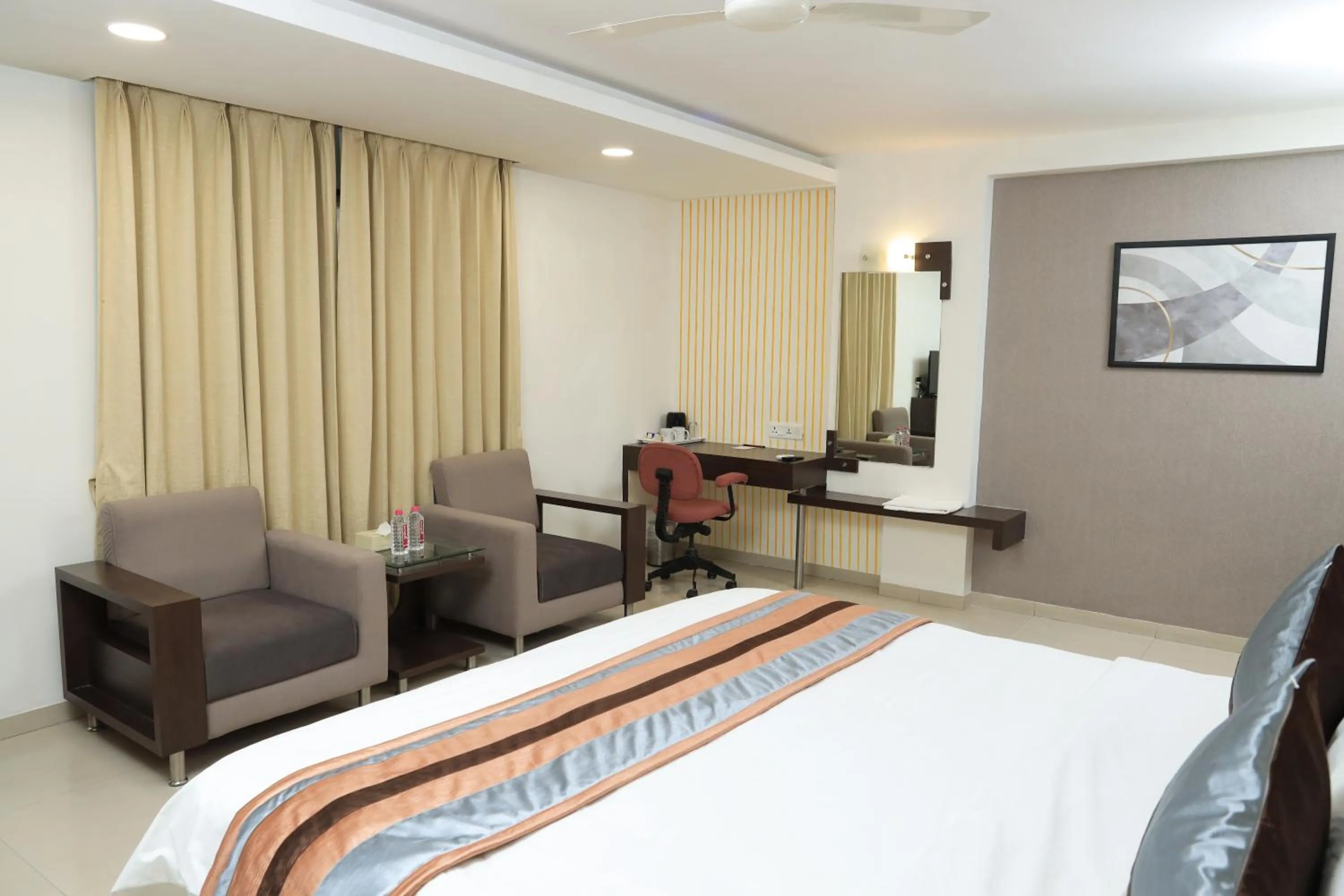 Bed in Click Hotel Yuvraj