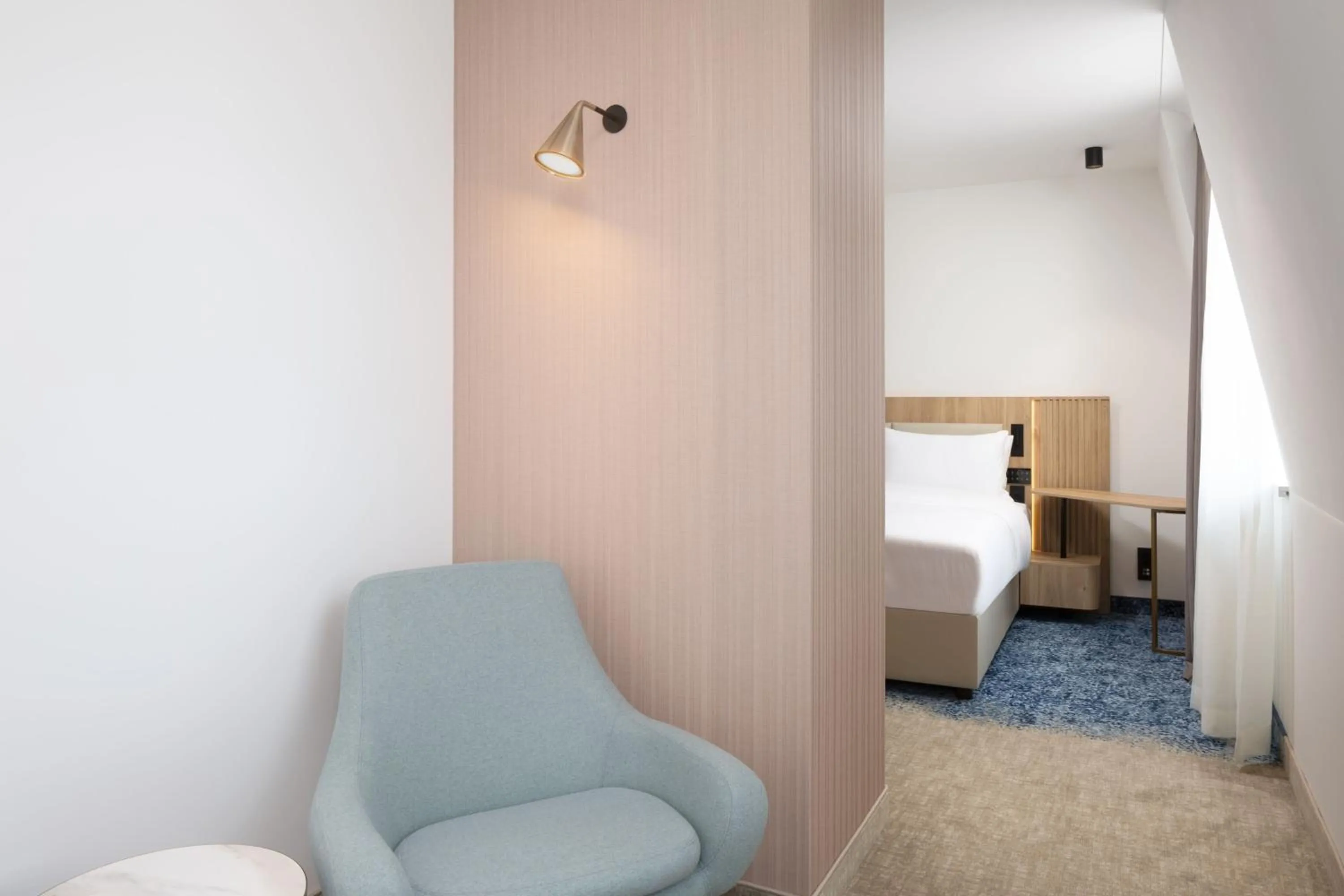 Photo of the whole room, Bed in Courtyard by Marriott Cluj - Napoca Downtown