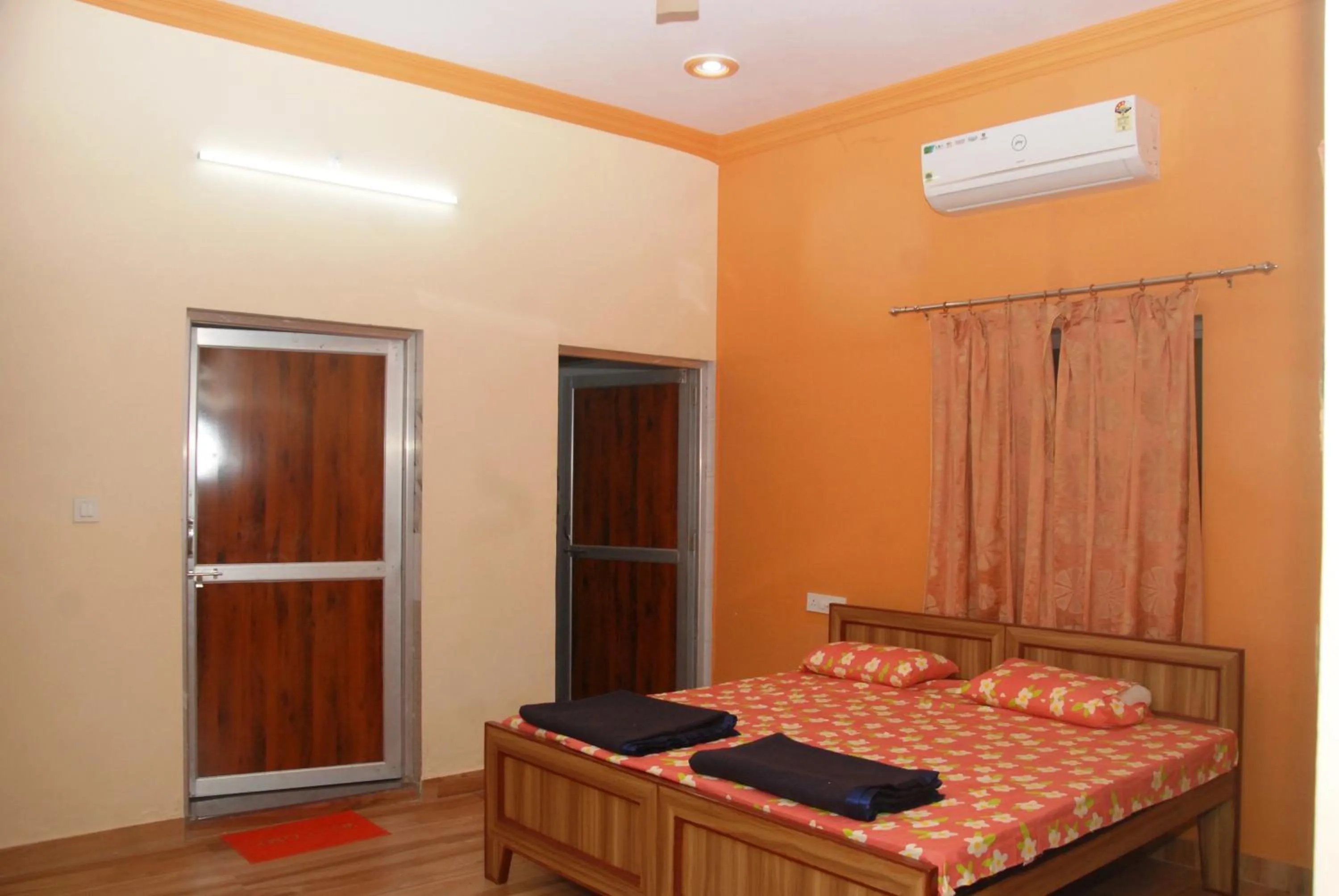 Bed in Yuvraj Nature Resort