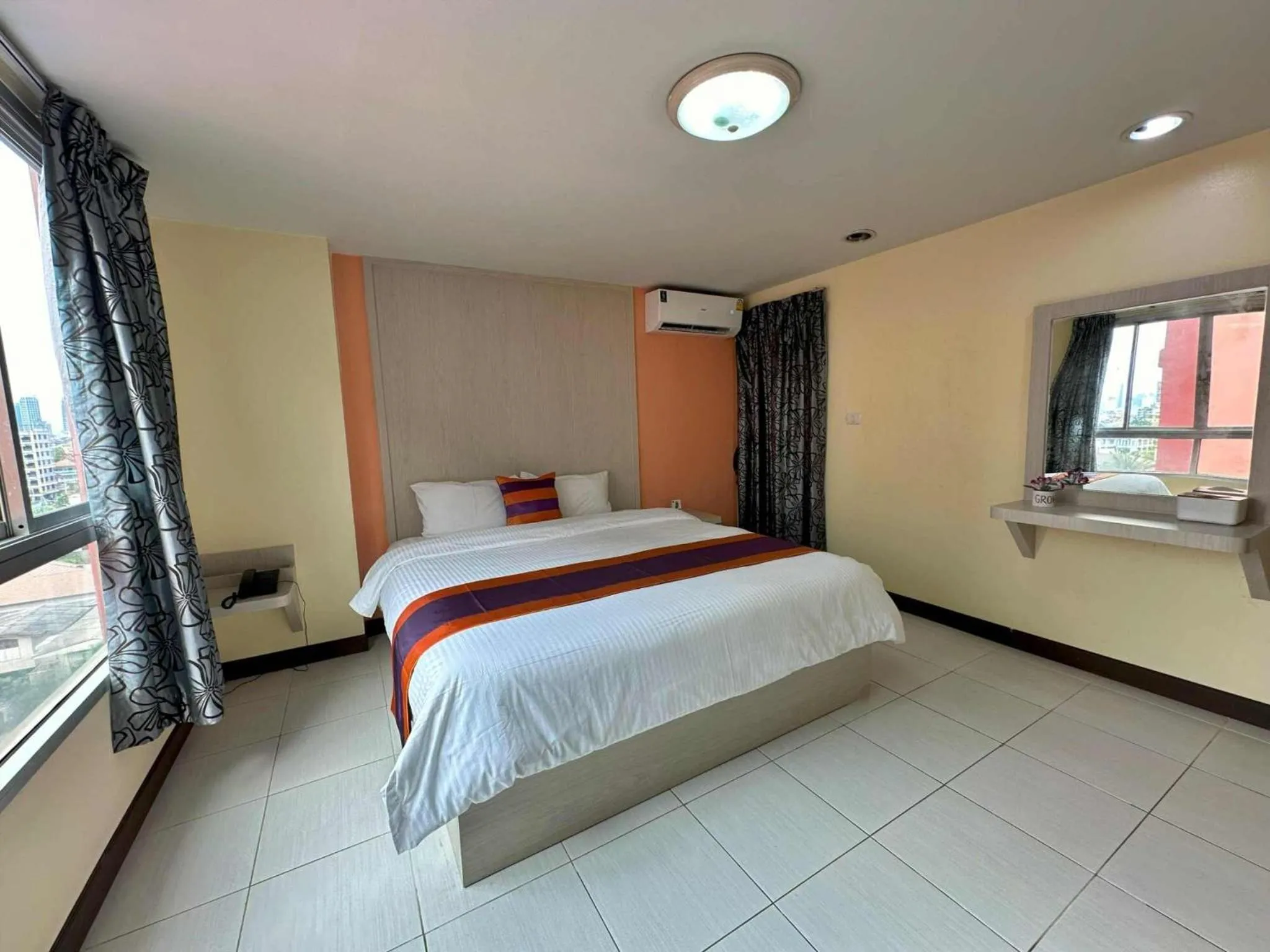 Bed in Aryan Suites Hotel