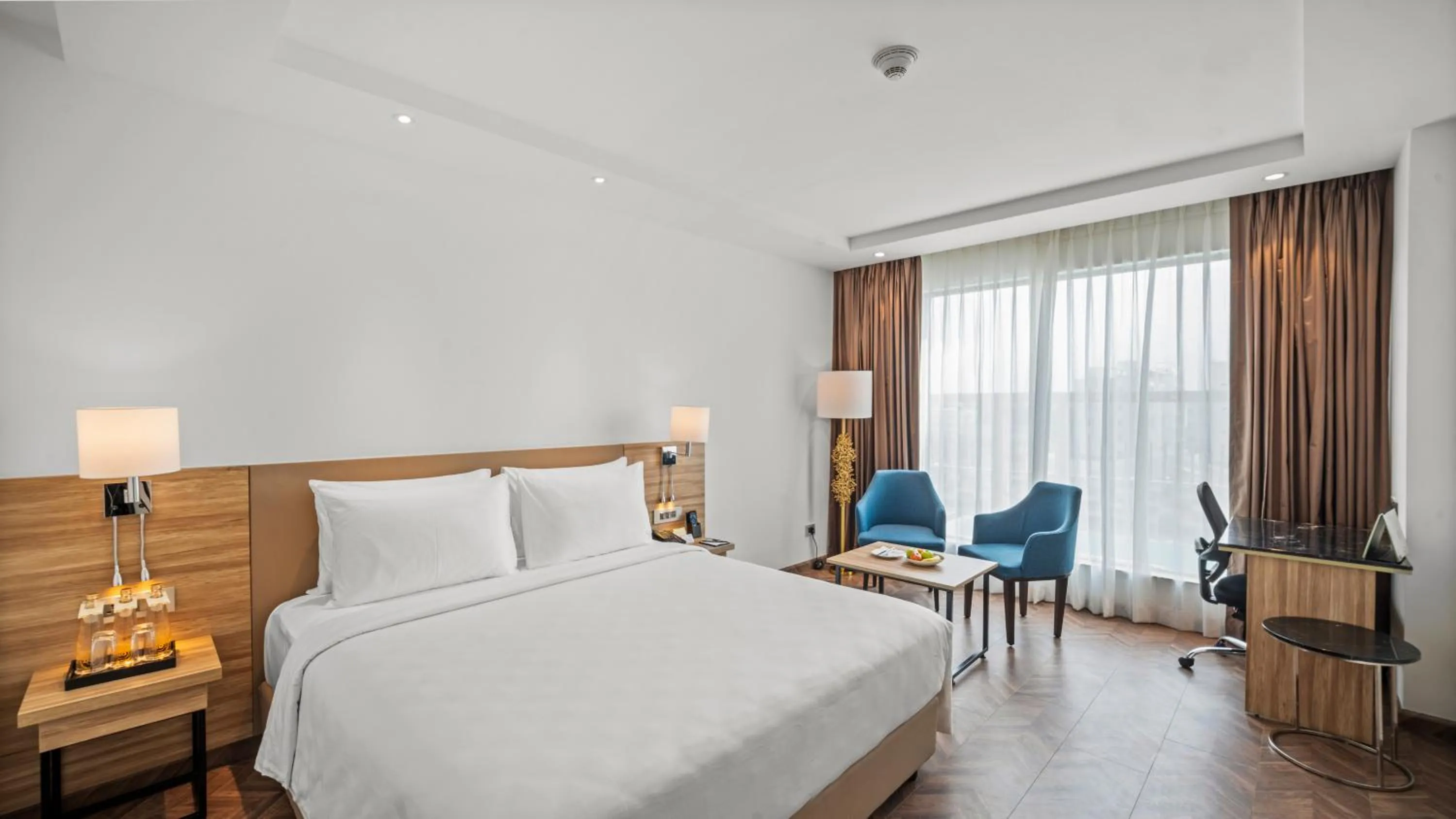 Photo of the whole room, Bed in Grand Vijayawada by GRT Hotels