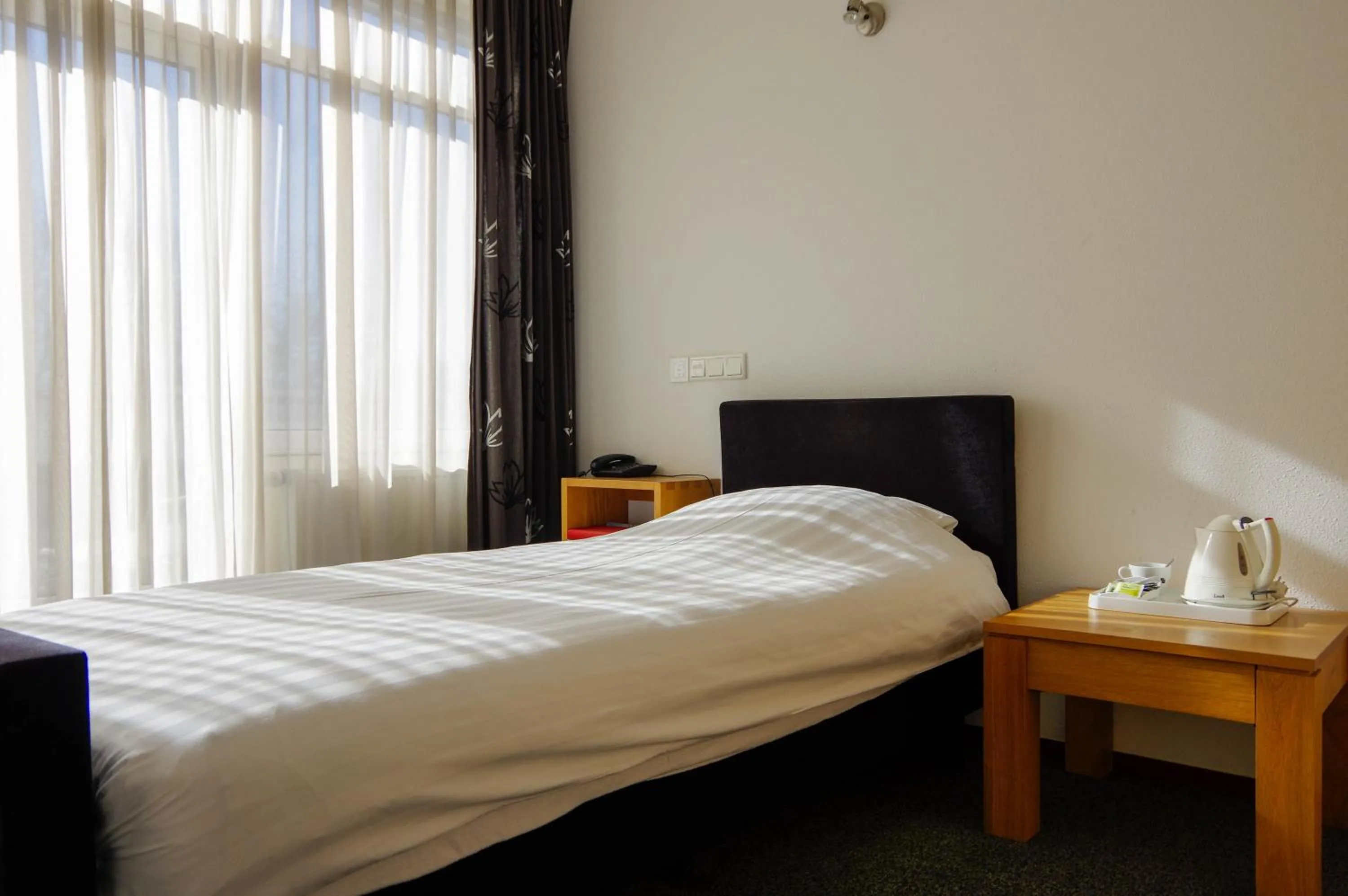 Bed in Hotel and Restaurant van Saaze