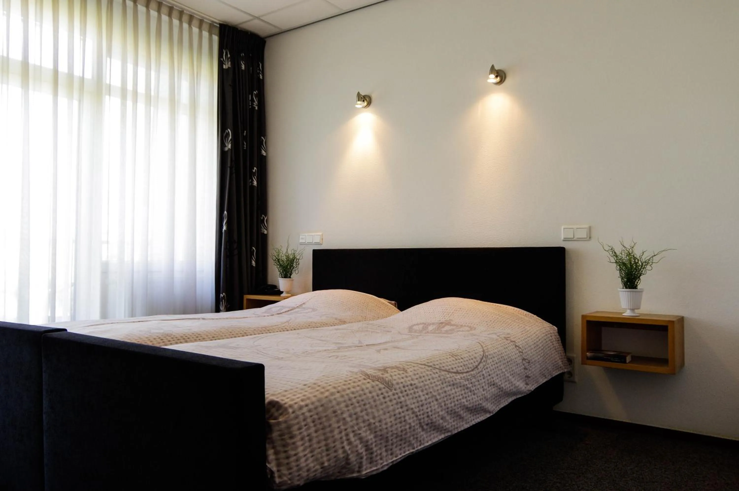 Bed in Hotel and Restaurant van Saaze