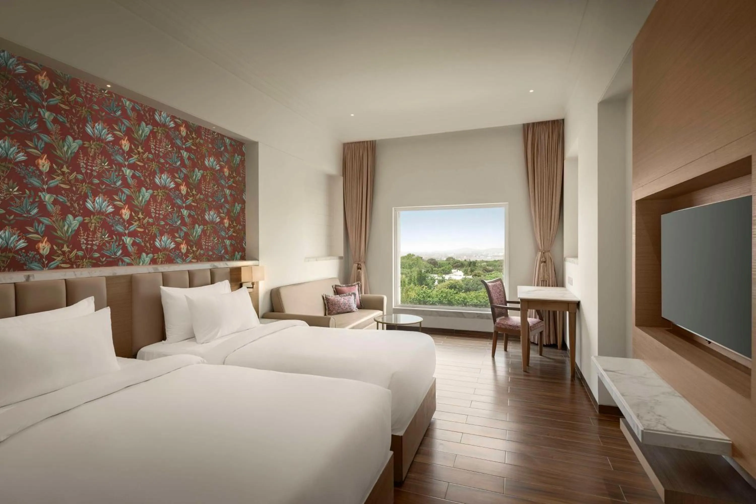 Bed in Jasraj Palace Yavatmal Hotel, a member of Radisson Individuals