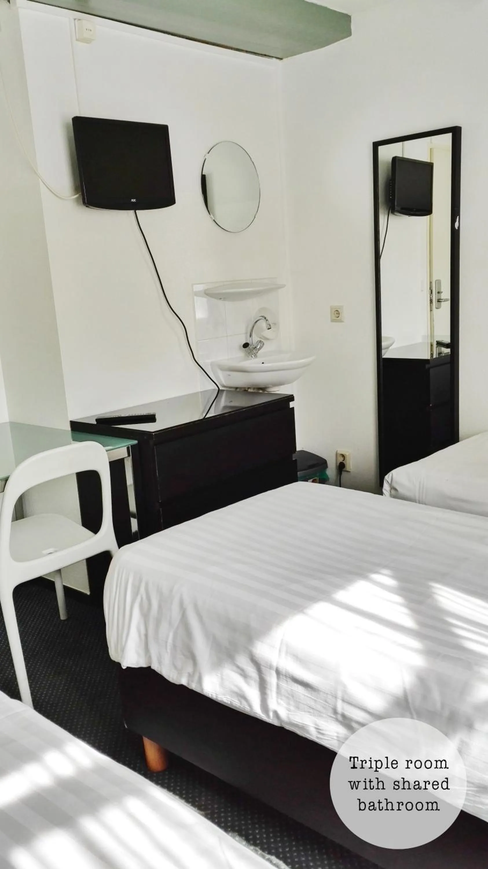 Bed in Rembrandt Square Hotel