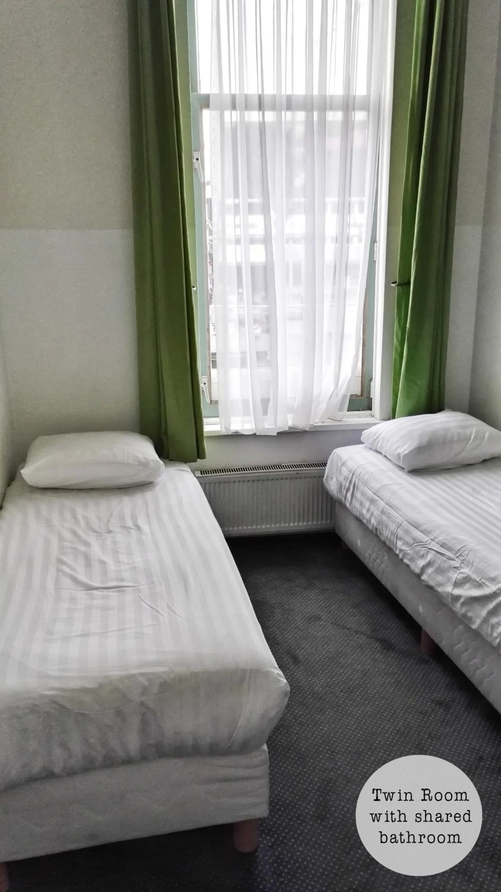 Bed in Rembrandt Square Hotel