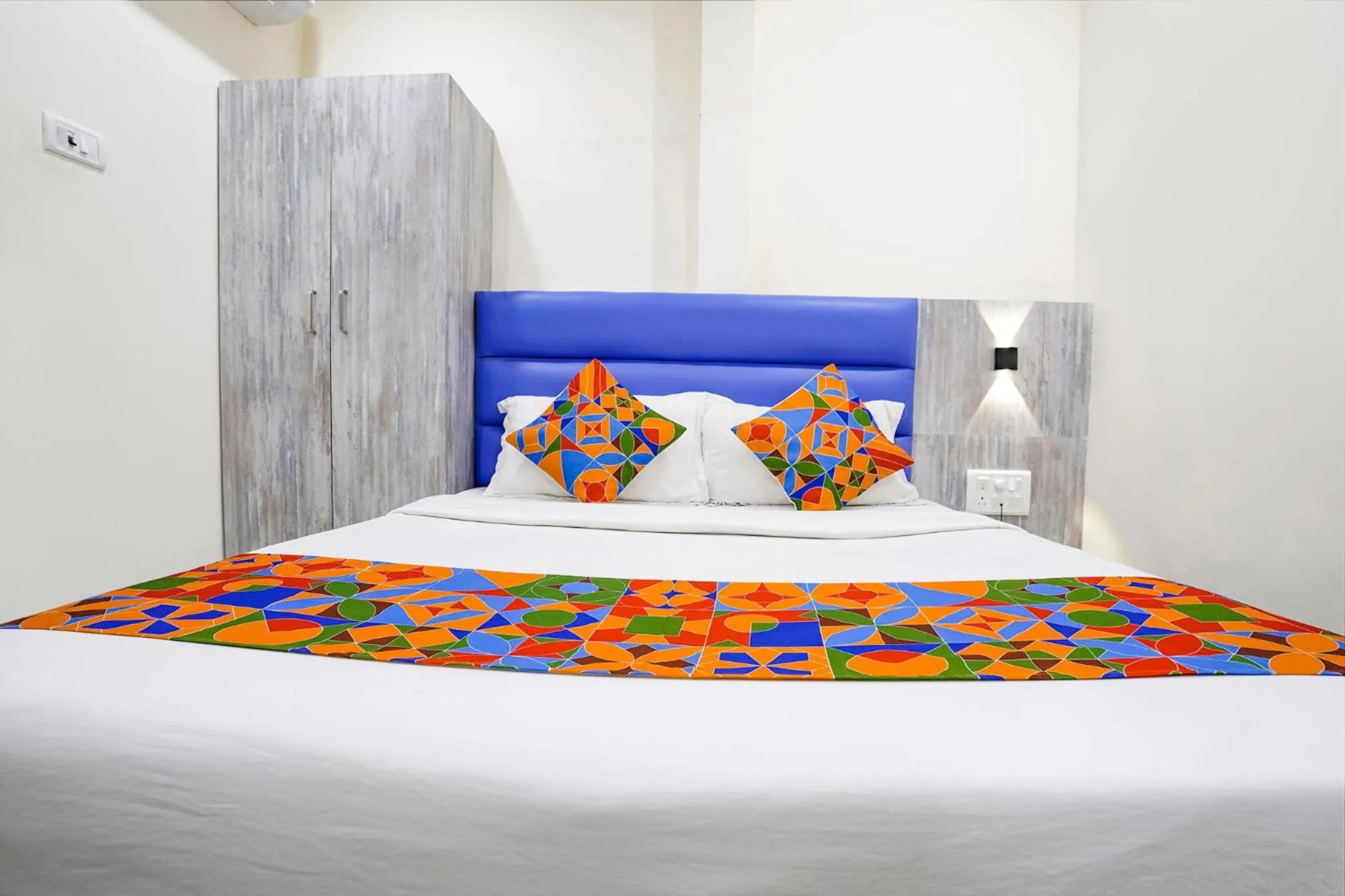 Bed in FabHotel Good Luck Residency