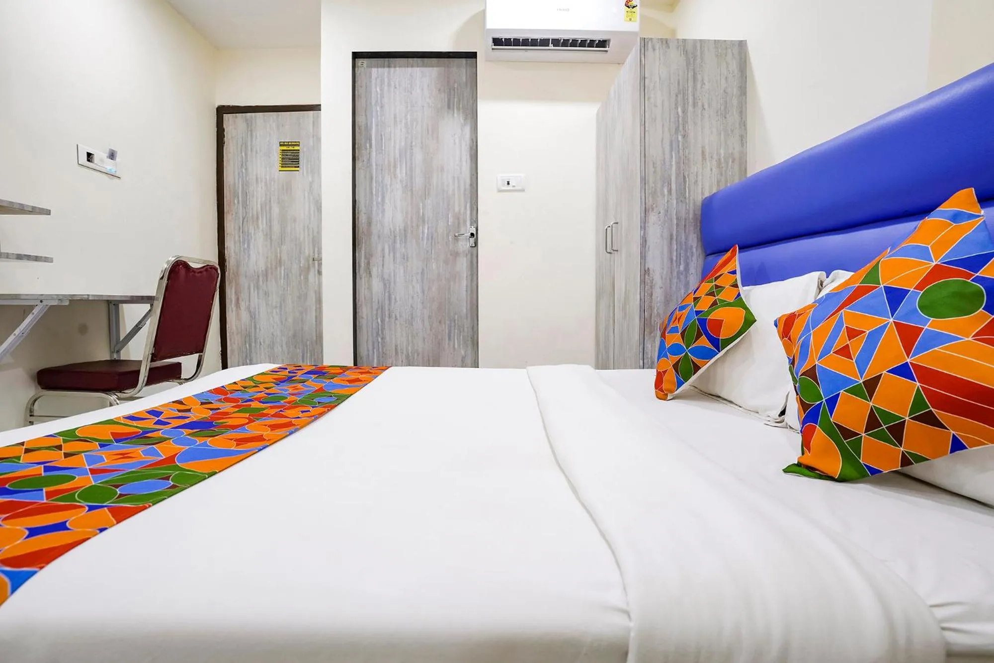 Bed in FabHotel Good Luck Residency