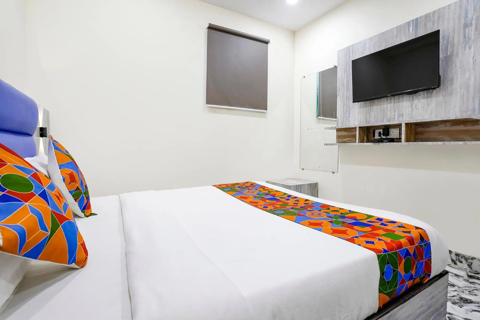 Bed in FabHotel Good Luck Residency