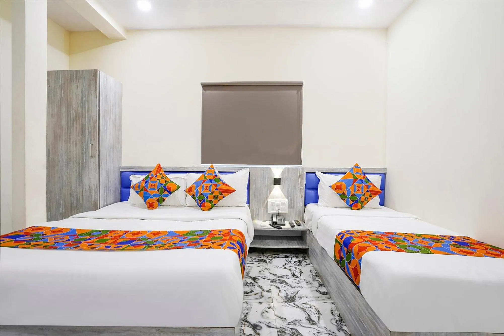 Bed in FabHotel Good Luck Residency