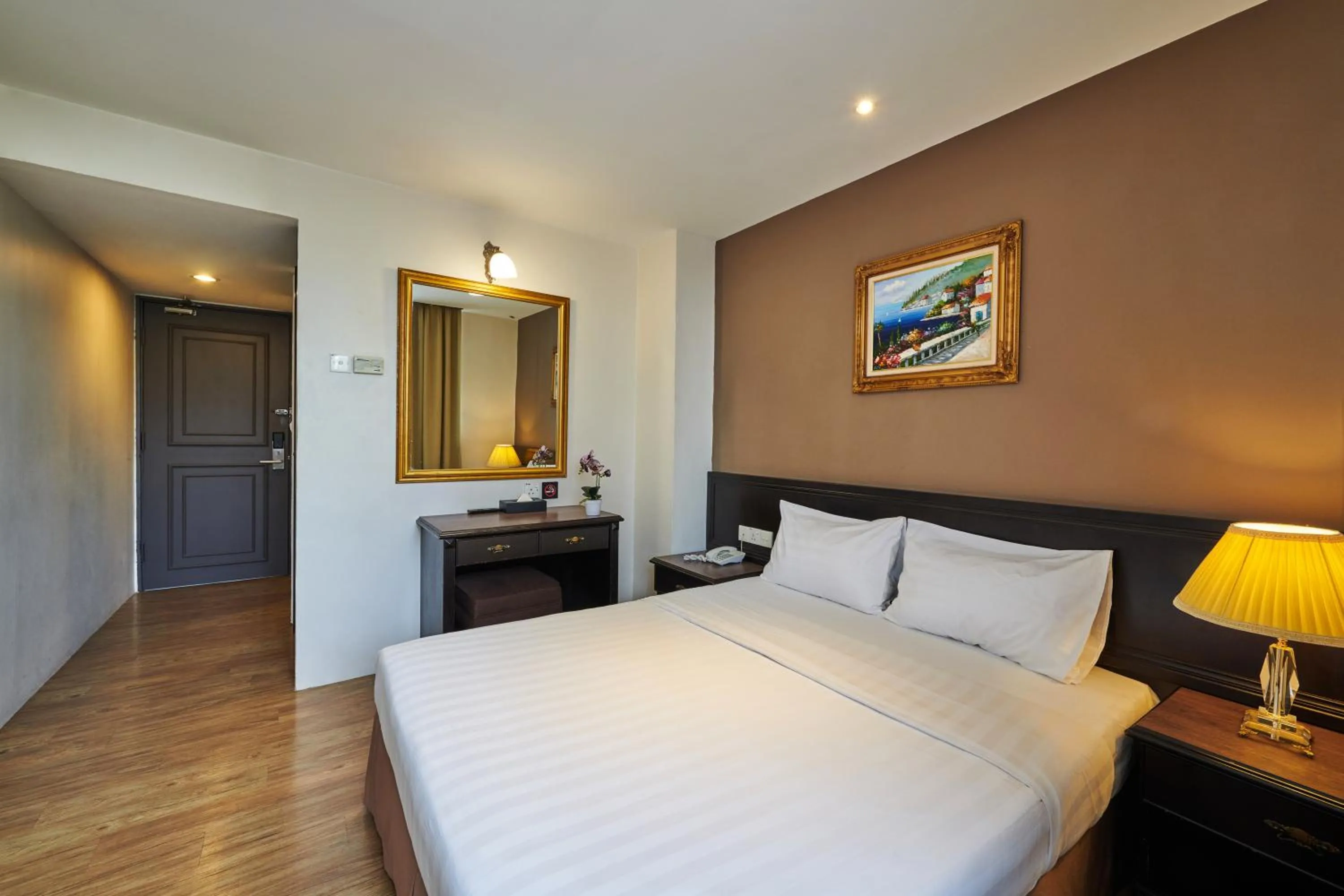 Bed in PJ De Inn Hotel