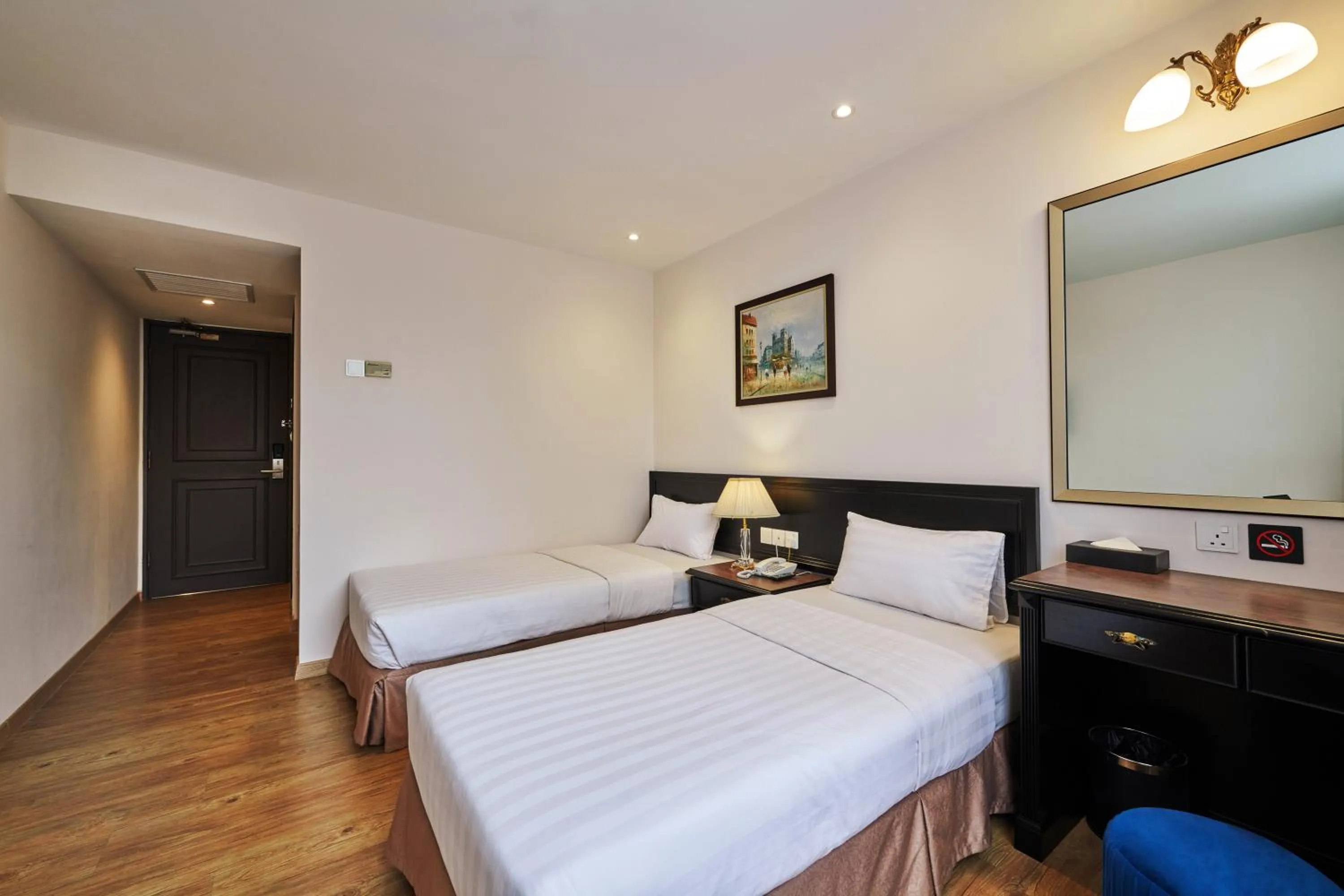 Bed in PJ De Inn Hotel