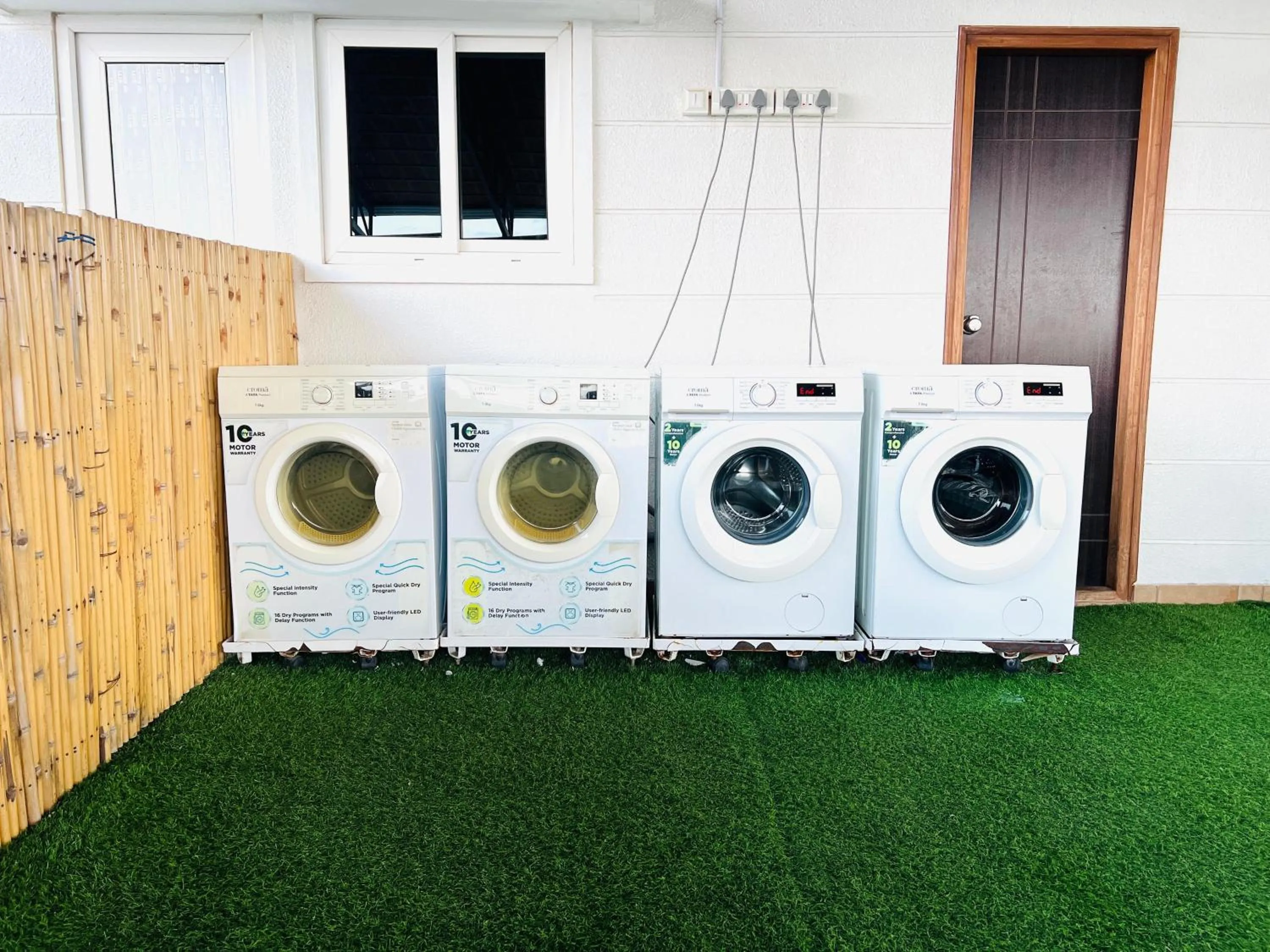 washing machine in Olive Serviced Apartments BTM Layout