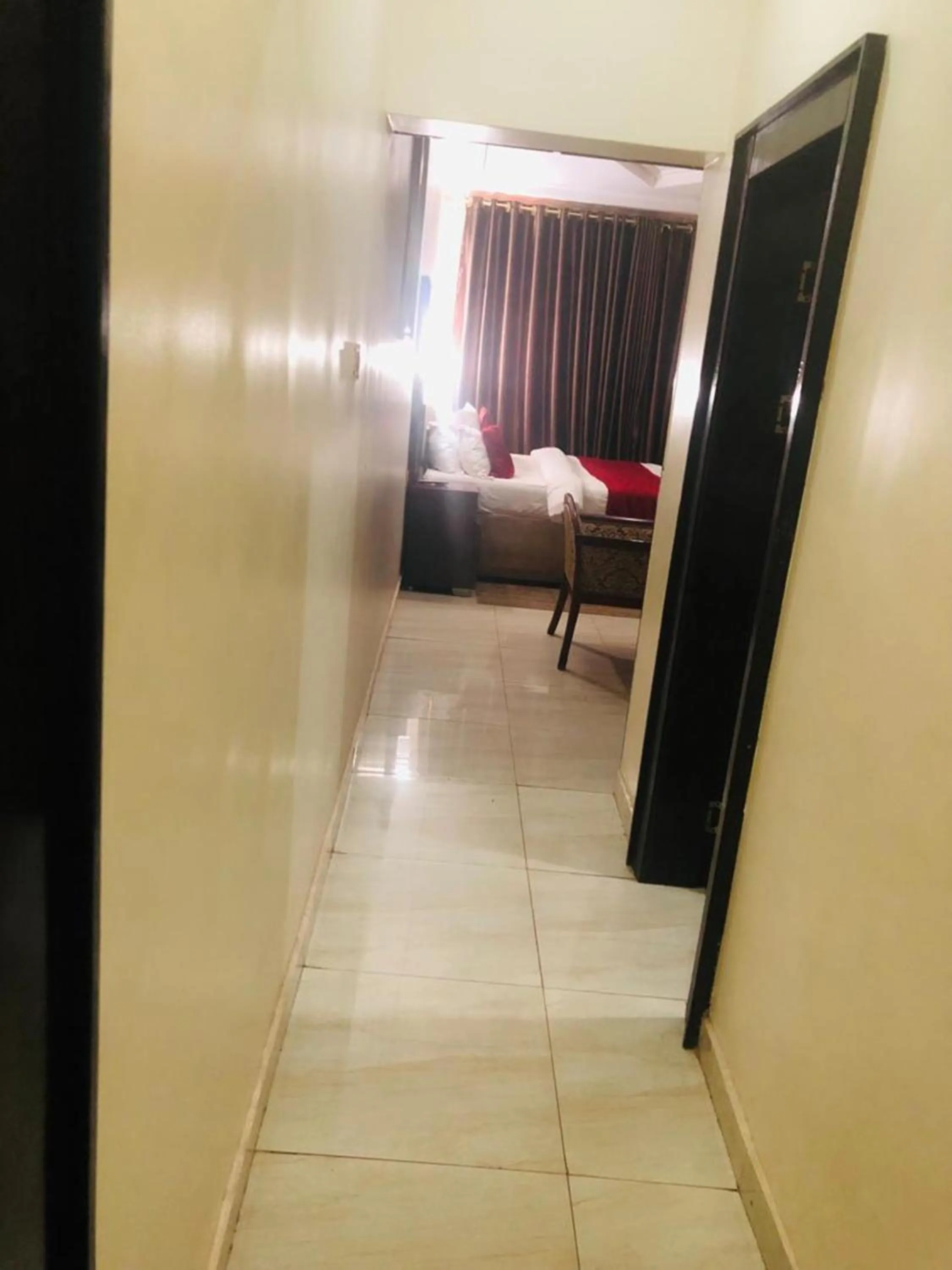 Photo of the whole room, Bed in MCLORRETS SUITES