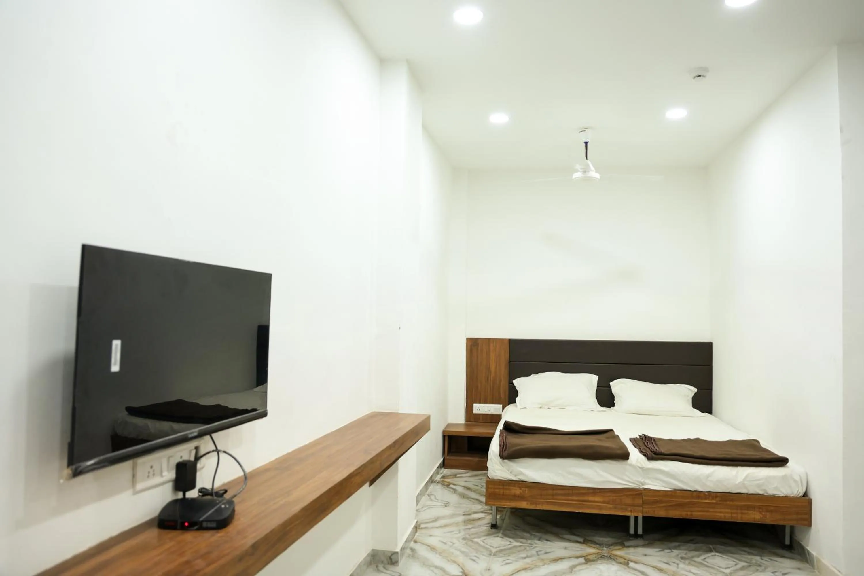 Bed in Hotel Aaram Kalupur