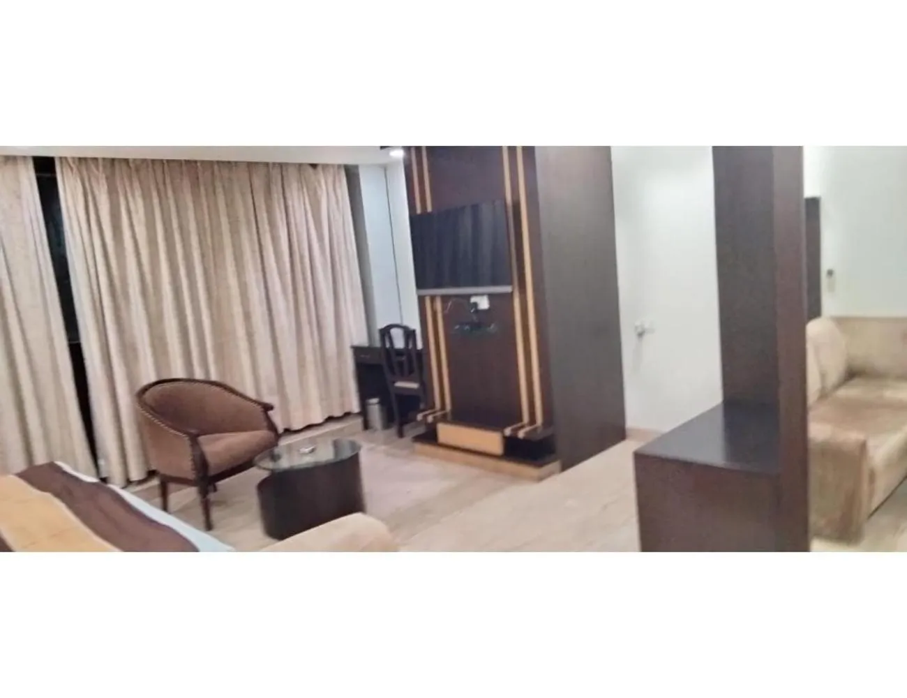 Communal lounge/ TV room in Hotel Blue Sapphire, Agra