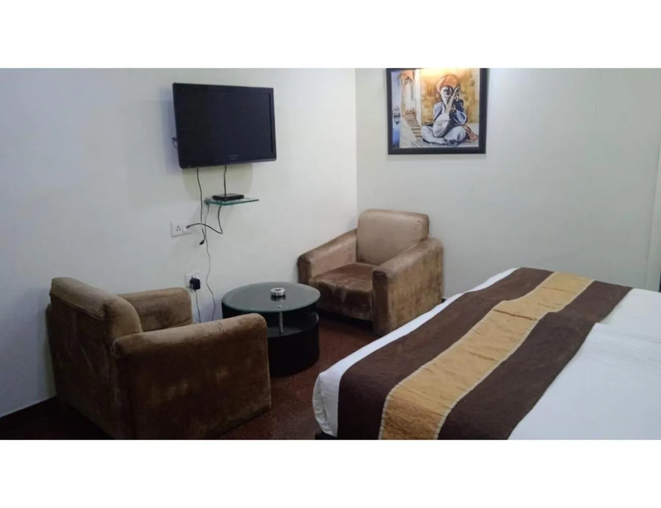 Communal lounge/ TV room, Bed in Hotel Blue Sapphire, Agra