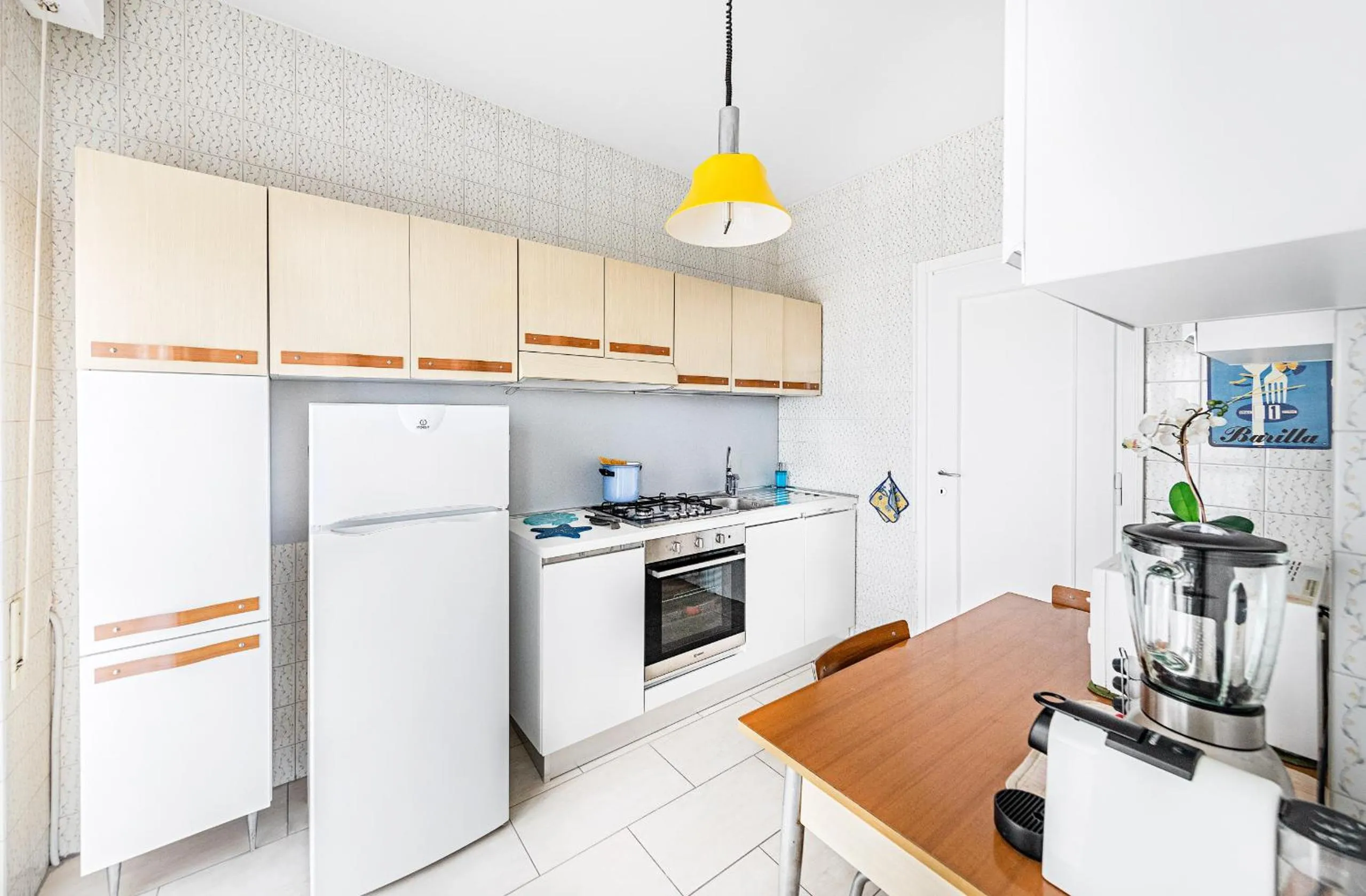 Kitchen or kitchenette in Le Orchidee 19 by Wonderful Italy