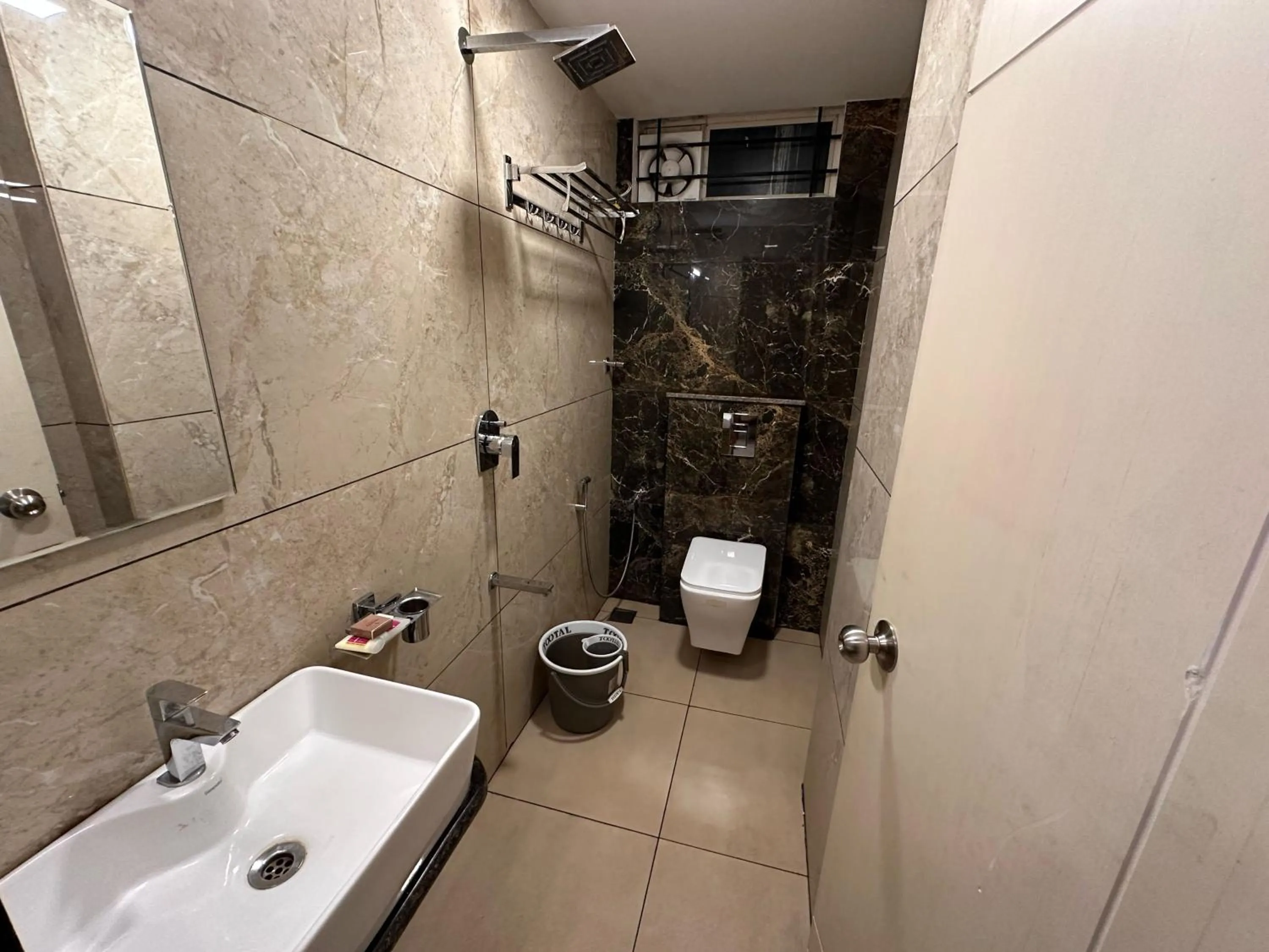 Bathroom in Collection O by OYO Local Square | Whitefield