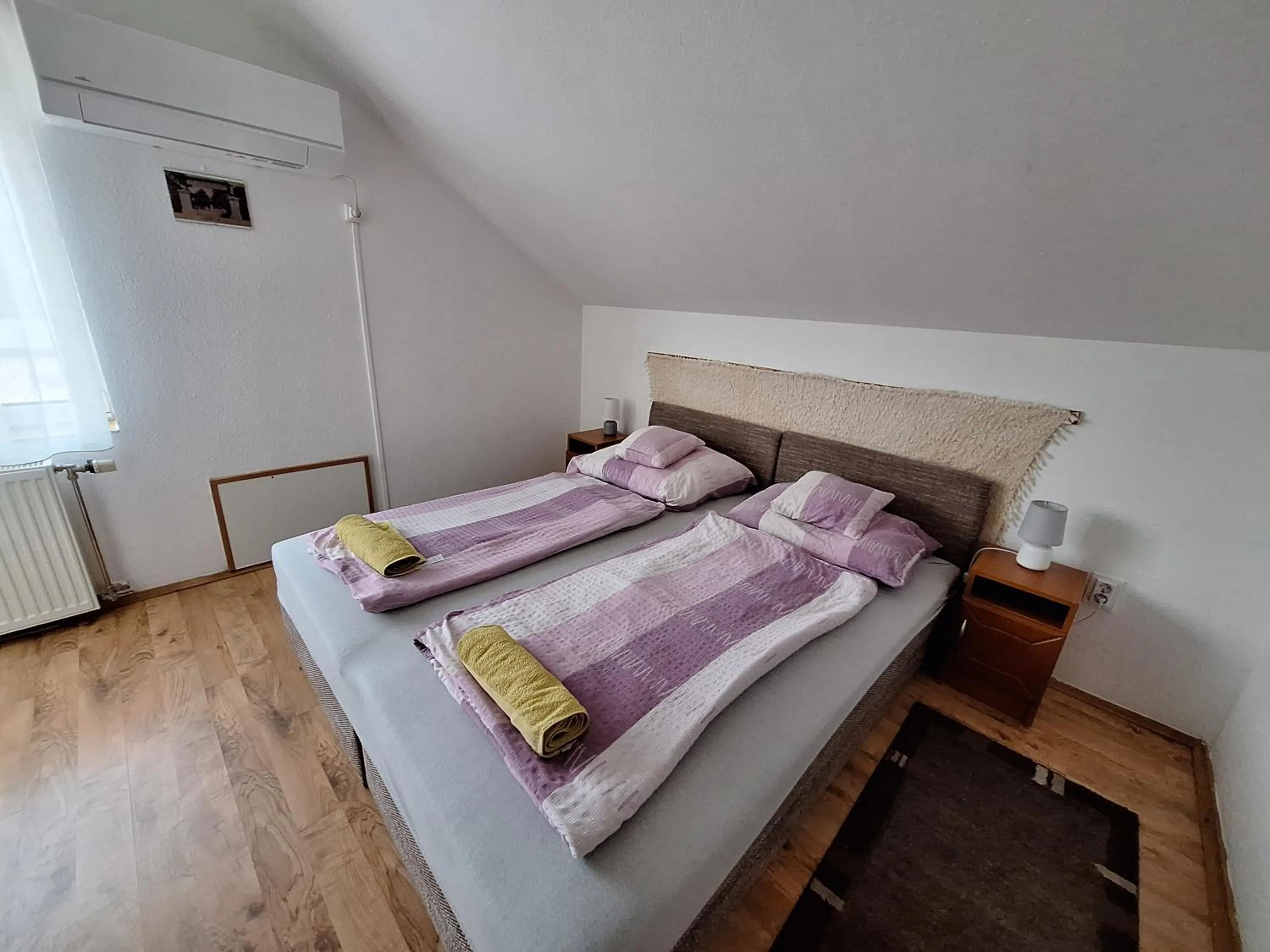 Bed in Lila Akác Vendégház Esztergom