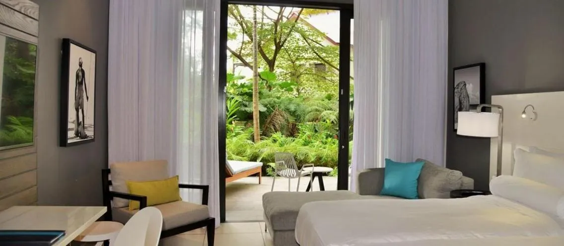 Bed in Eden Bleu Hotel