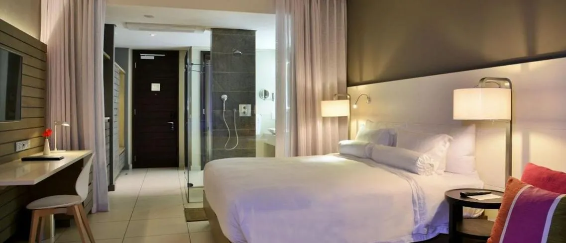 Bed in Eden Bleu Hotel