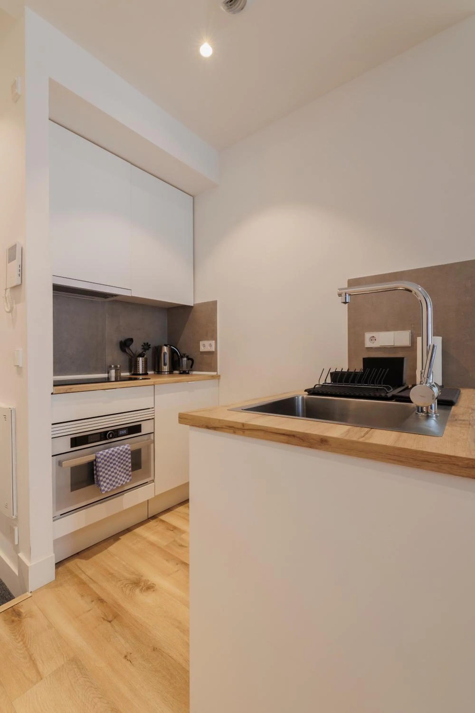 Kitchen or kitchenette in Fomento by Wynwood House