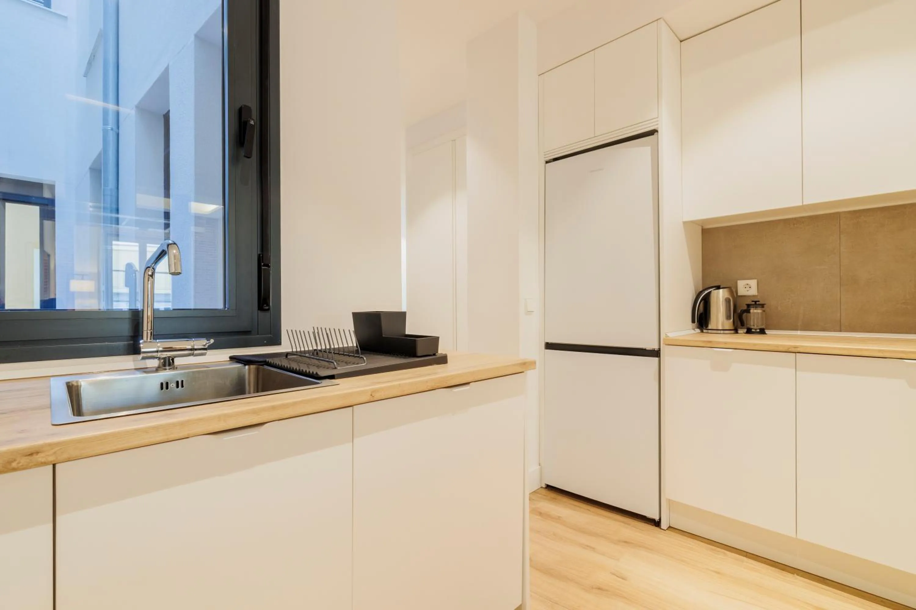 Kitchen or kitchenette in Fomento by Wynwood House