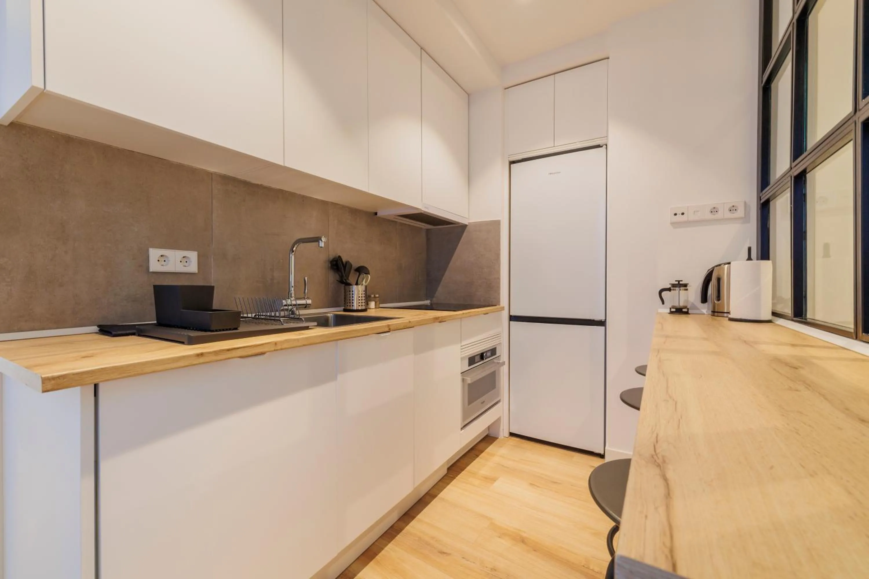 Kitchen or kitchenette in Fomento by Wynwood House