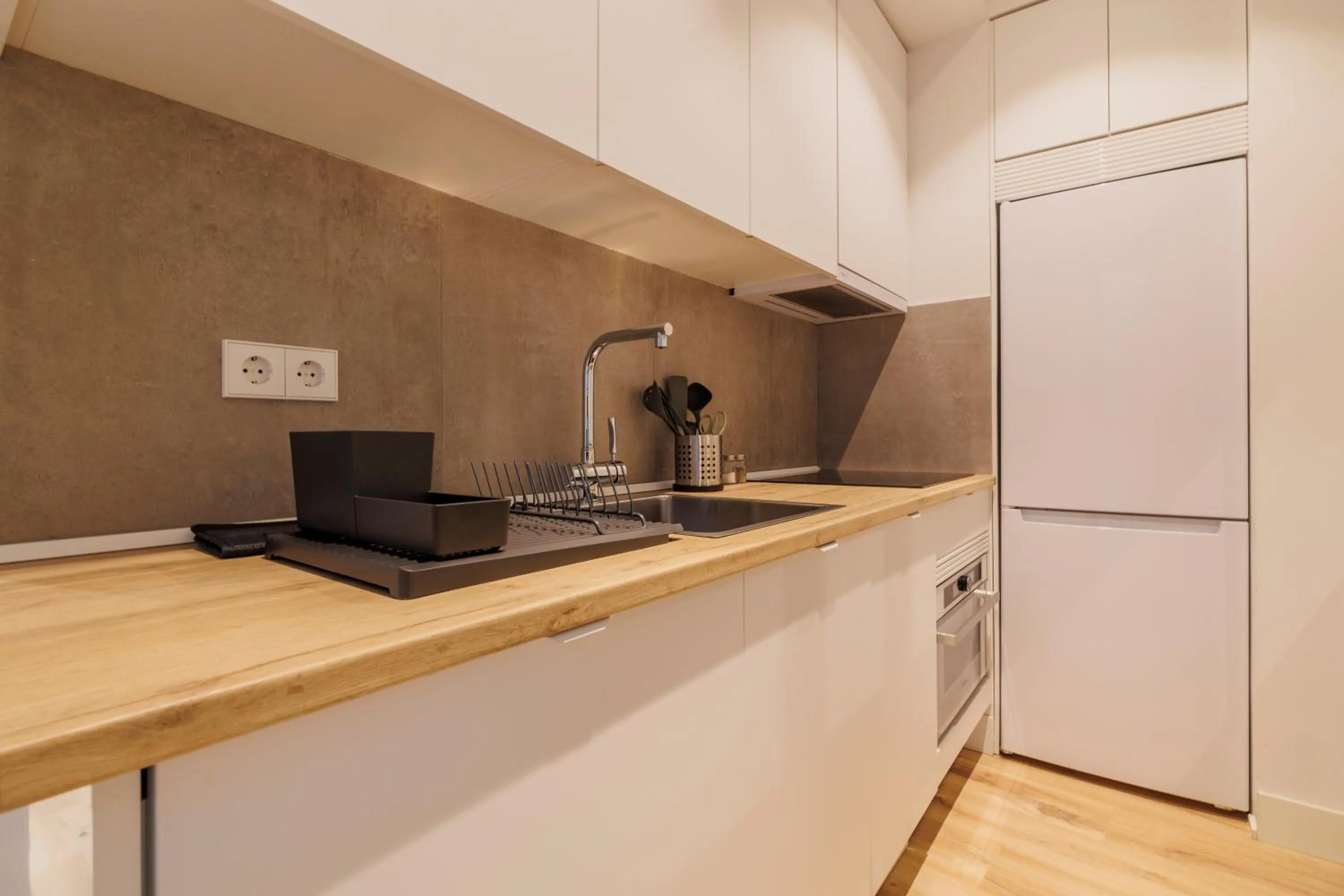 Kitchen or kitchenette in Fomento by Wynwood House