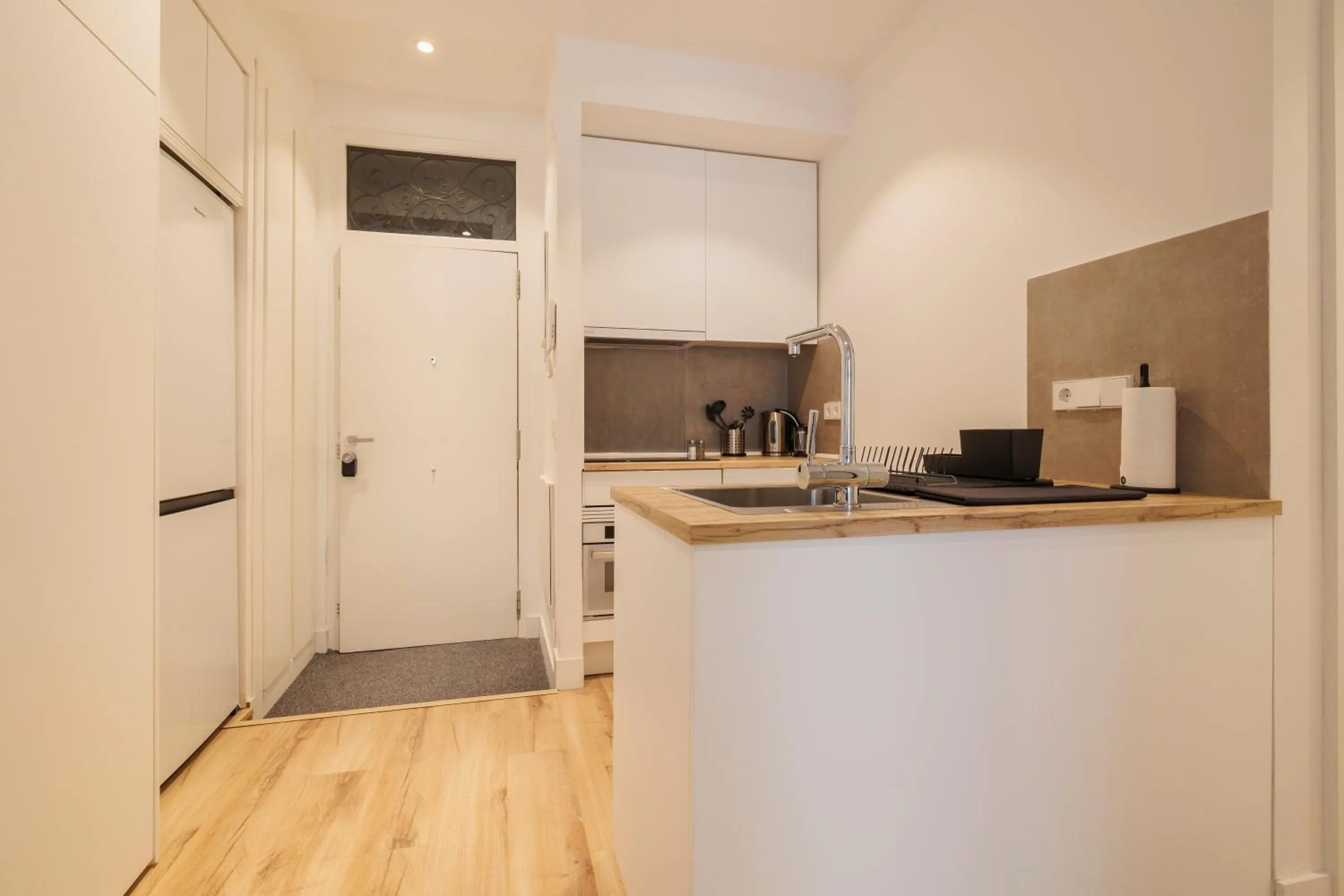 Kitchen or kitchenette in Fomento by Wynwood House