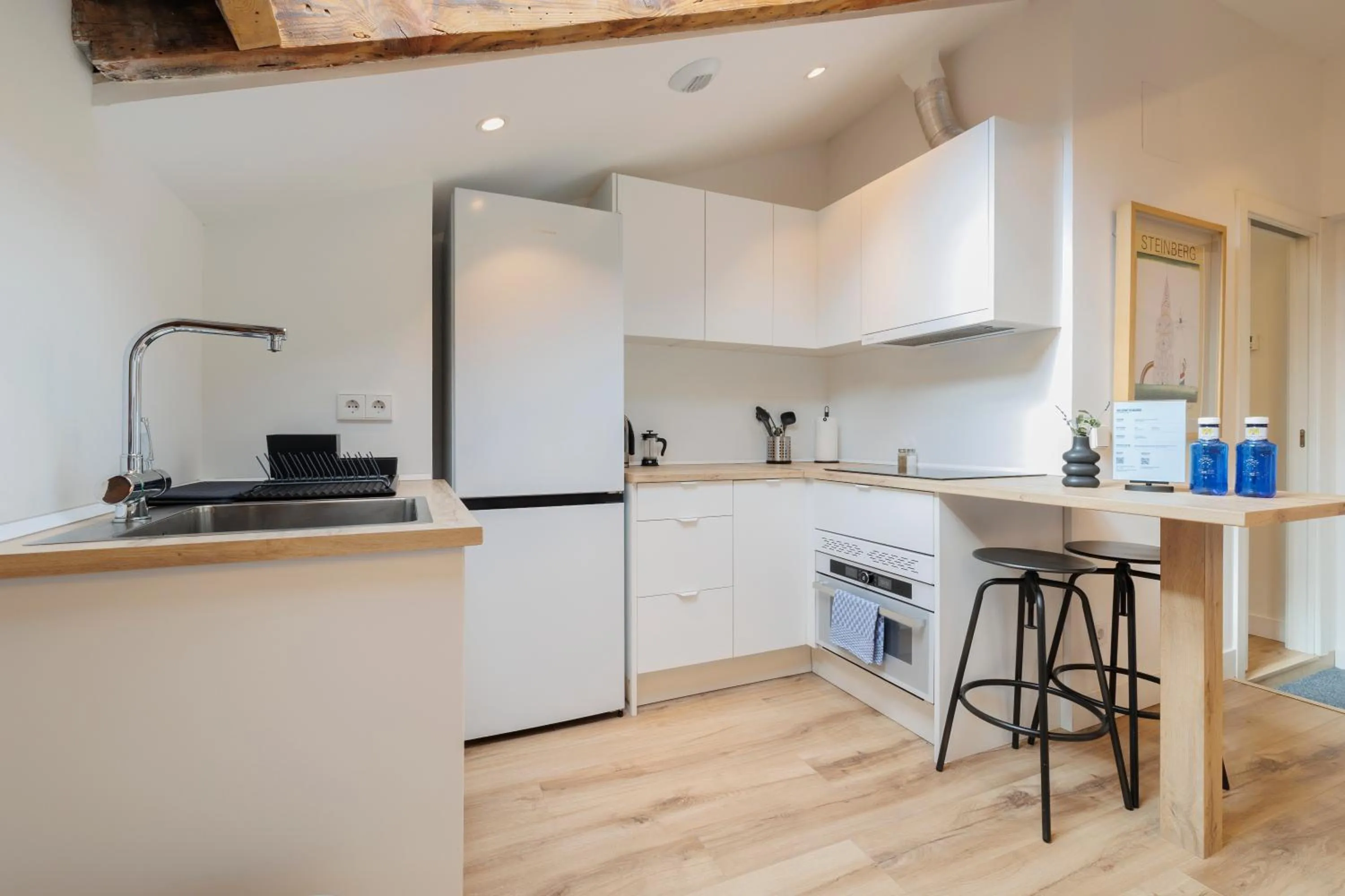 Kitchen or kitchenette in Fomento by Wynwood House