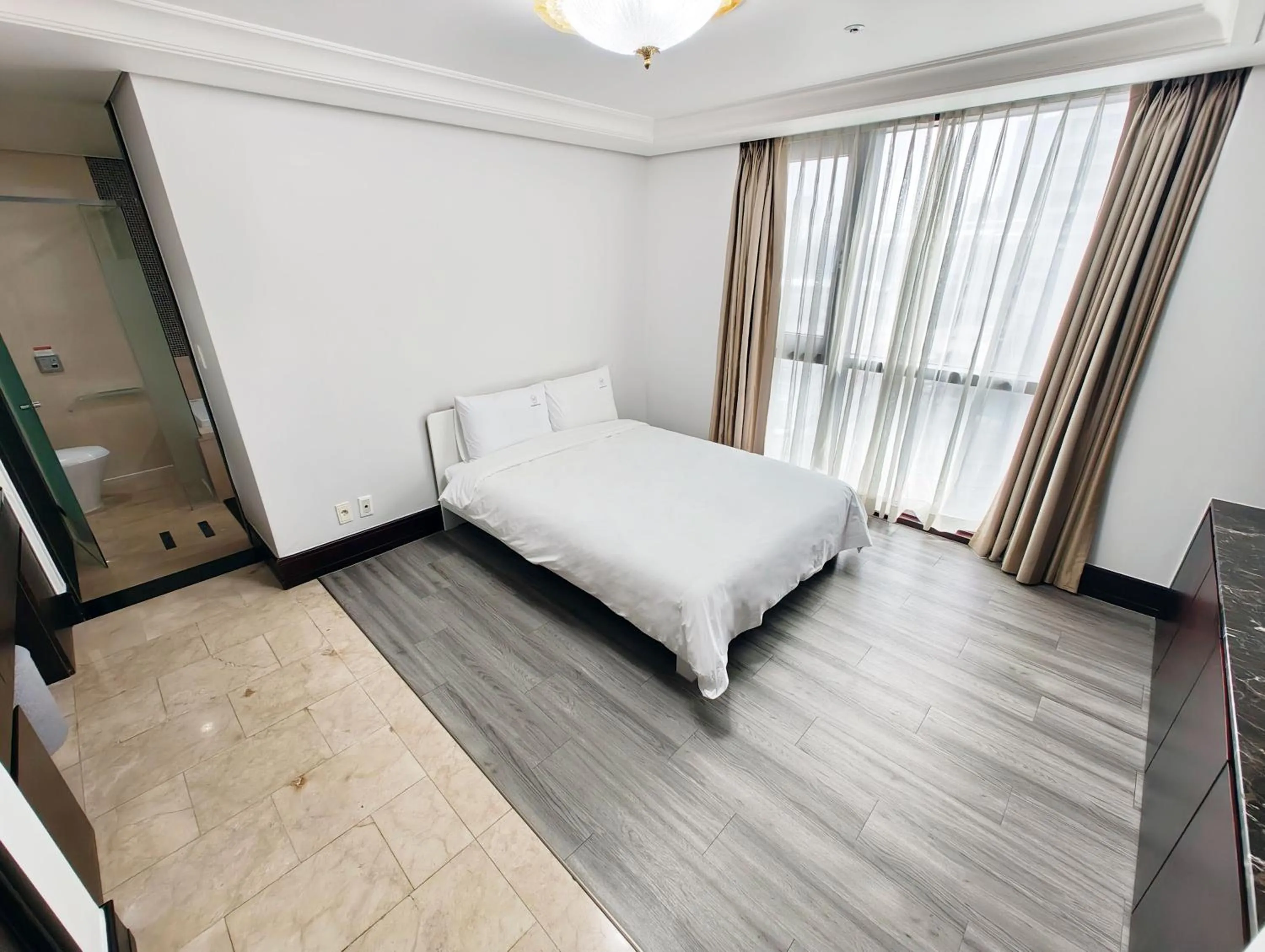 Bed in W Residence Hotel Centum City