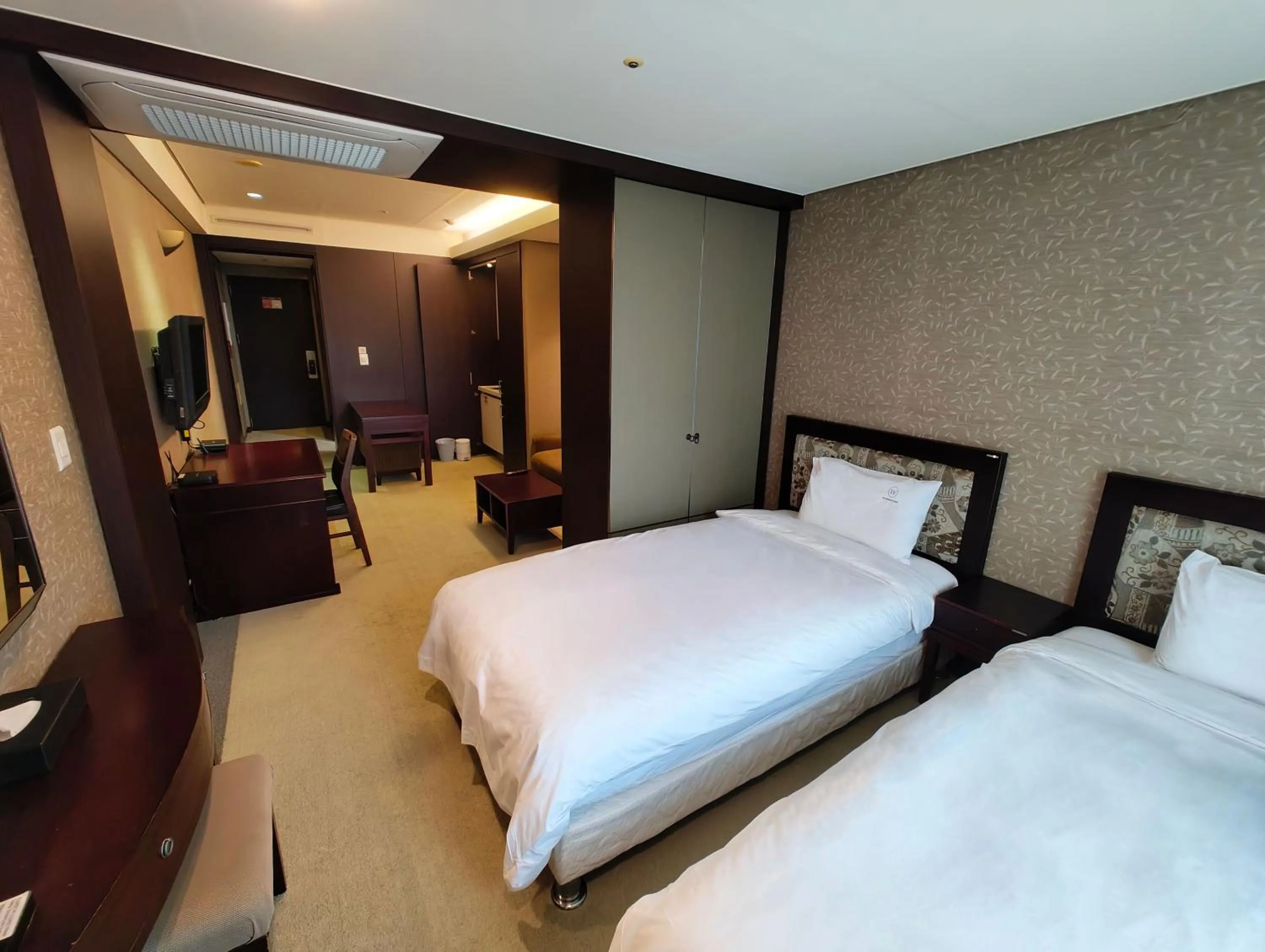 Bed in W Residence Hotel Centum City