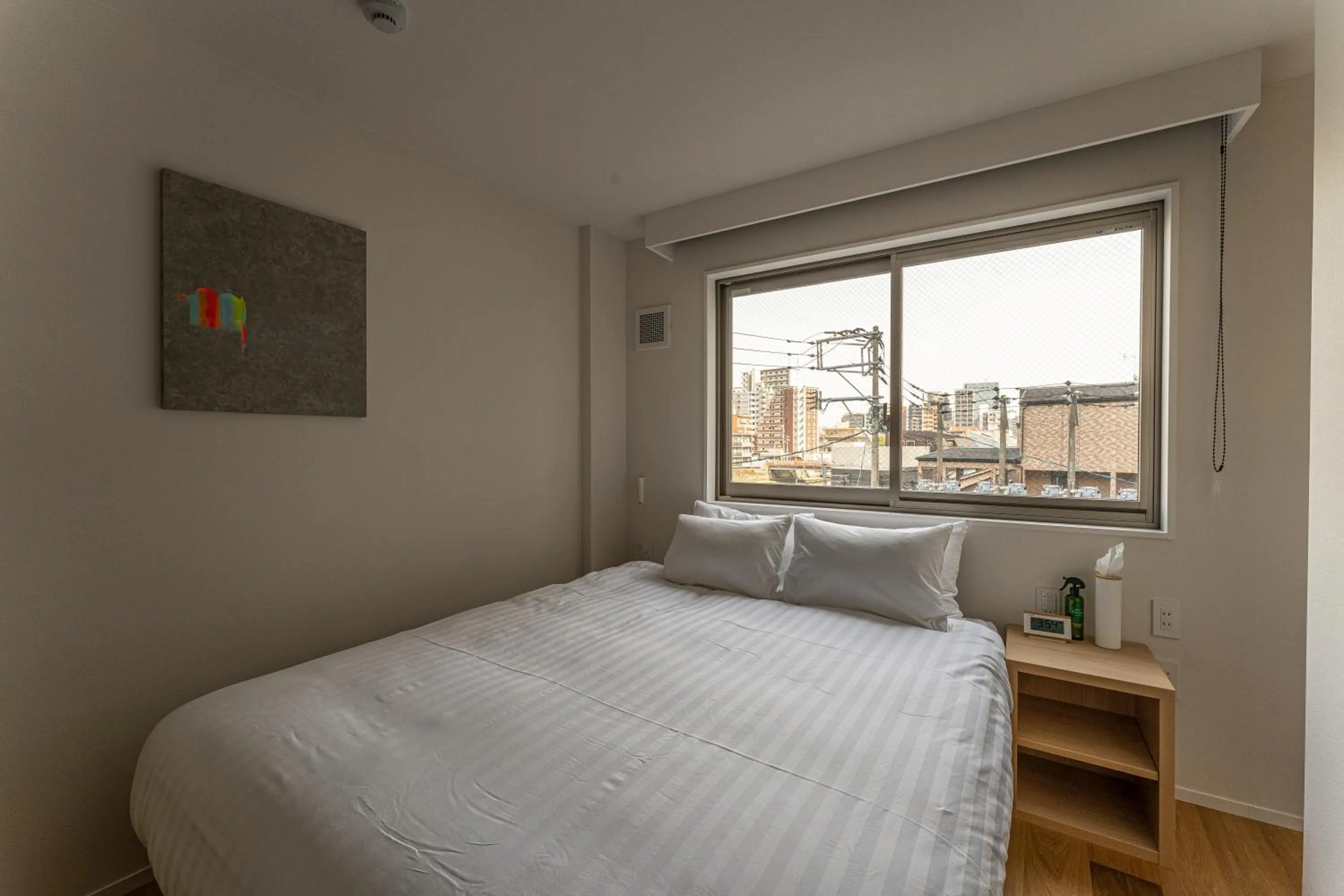 Bed in 9HOTEL Tenjin