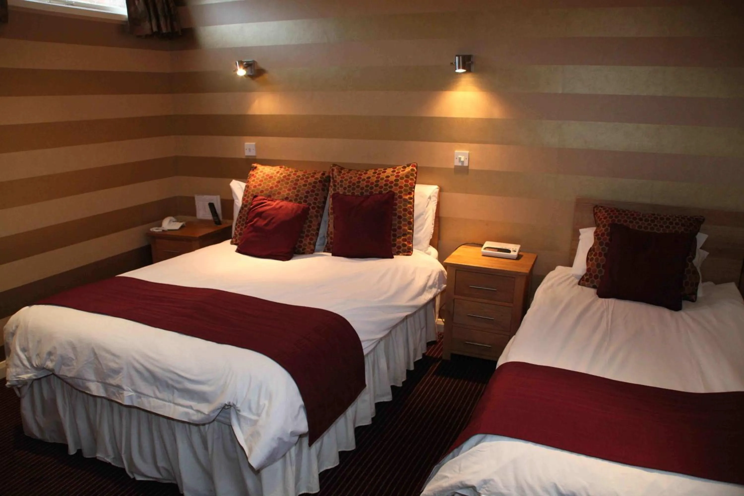 Bed in The Dog & Partridge Country Inn