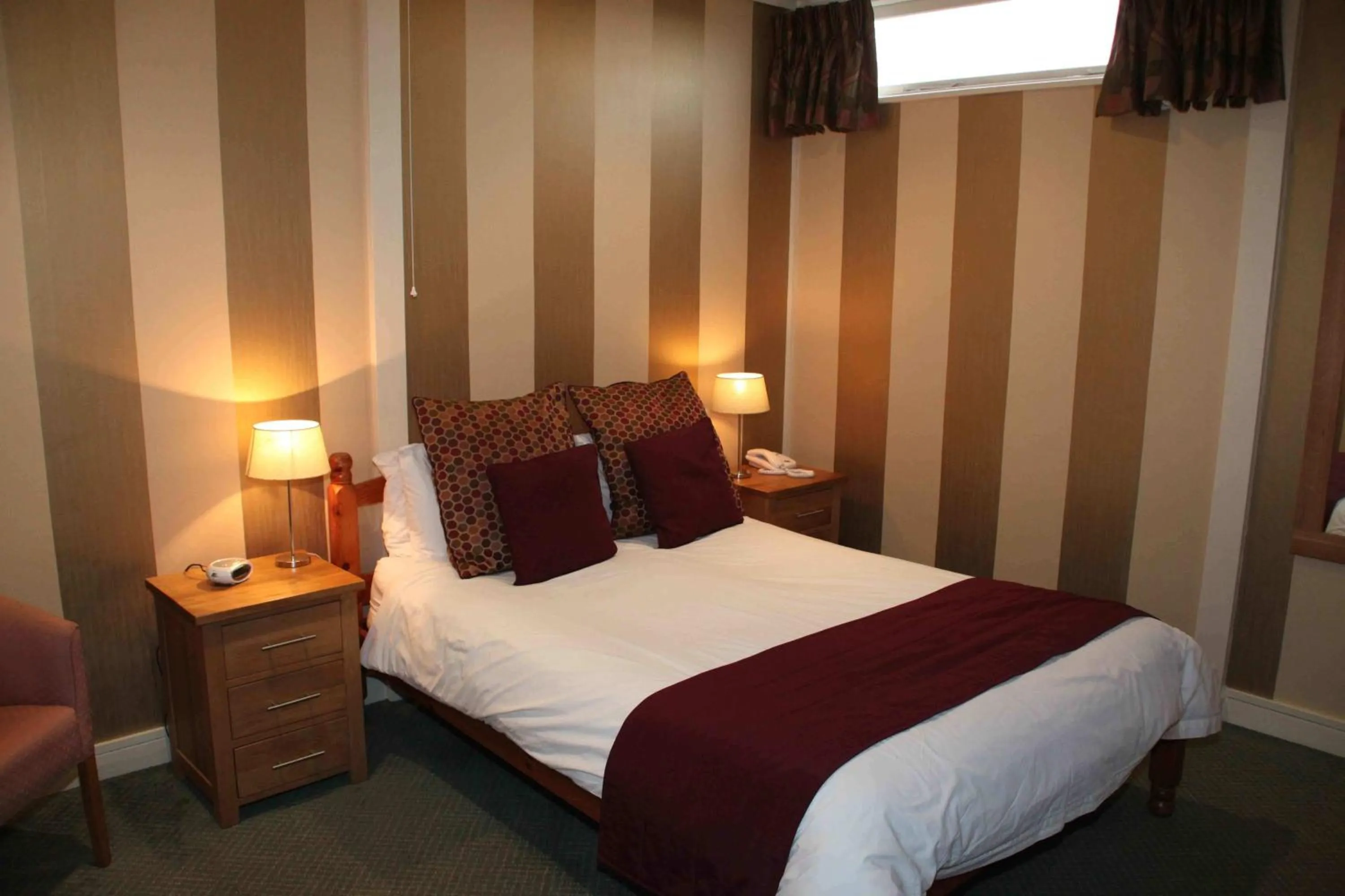 Bed in The Dog & Partridge Country Inn