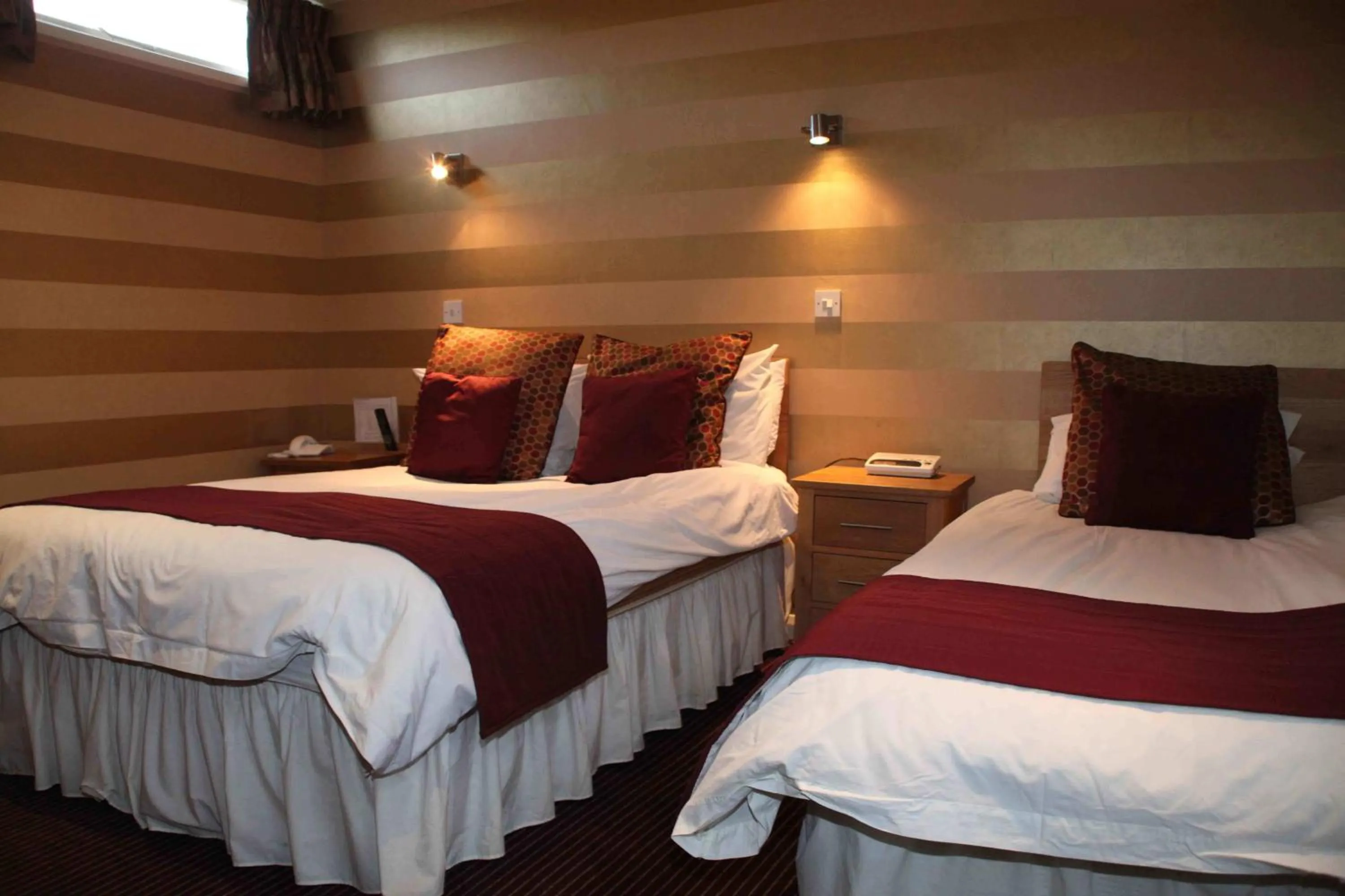 Bed in The Dog & Partridge Country Inn