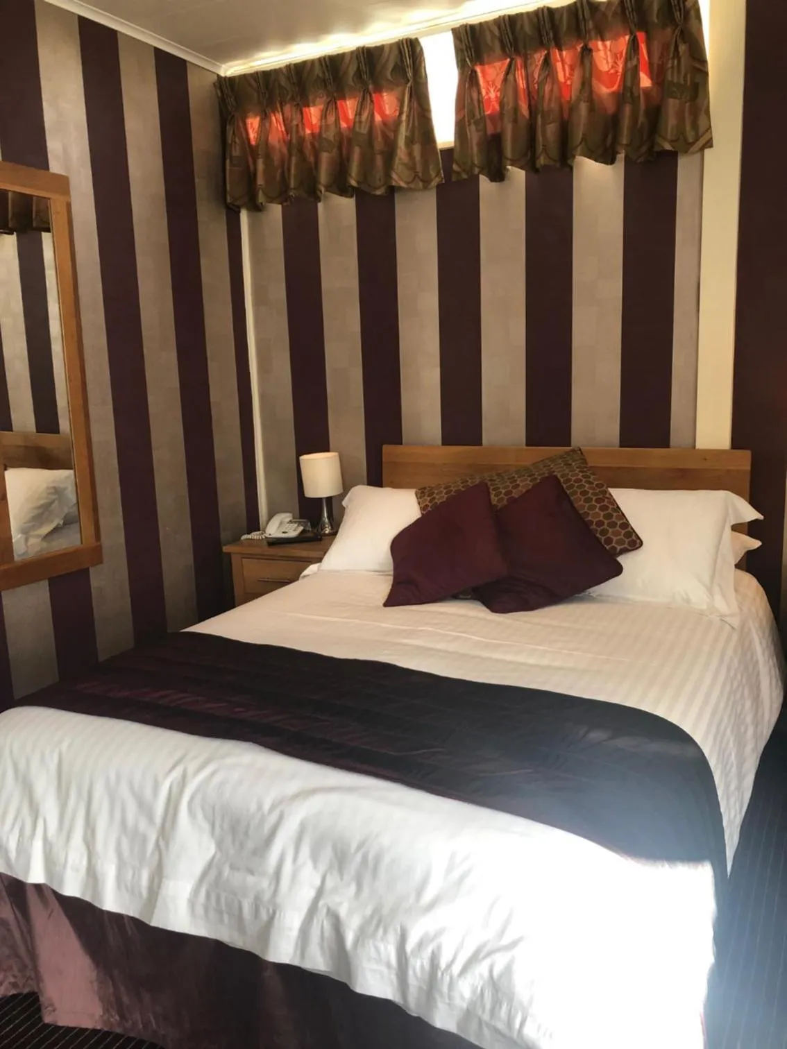 Bed in The Dog & Partridge Country Inn