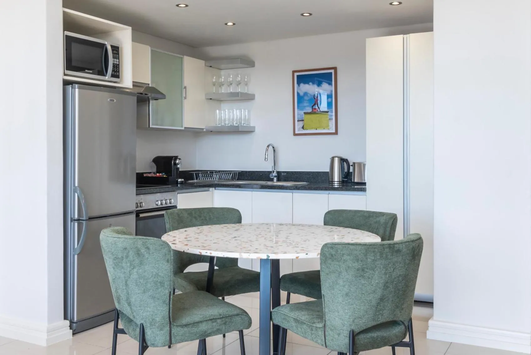 Kitchen or kitchenette in Xenia Aparthotel by Totalstay