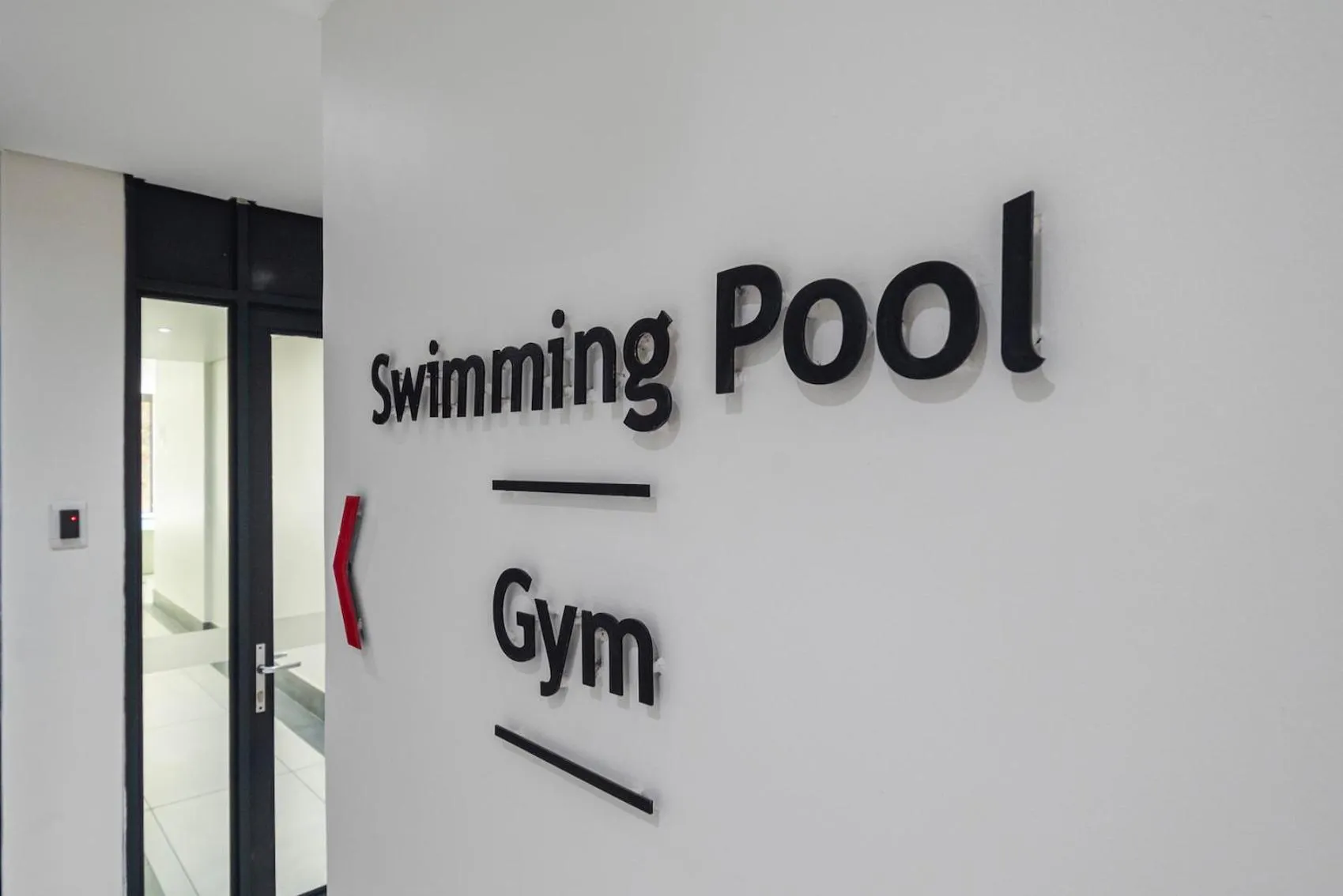 Swimming pool in Xenia Aparthotel by Totalstay